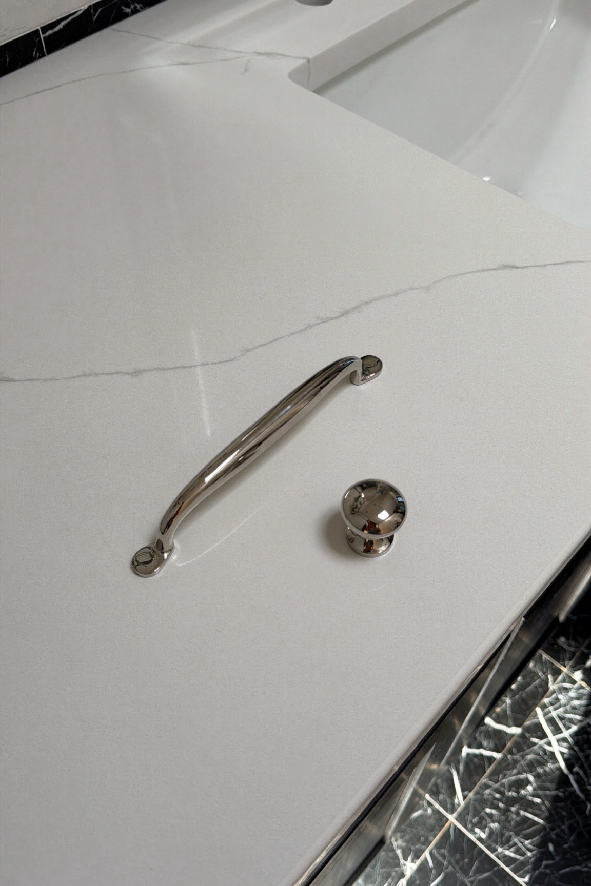 I bought this hardware from Pottery Barn and polished nickel. It looks so good in the bathroom, but it would also look nice in a kitchen. French, modern, coastal, new build.￼

#LTKHome #LTKSaleAlert