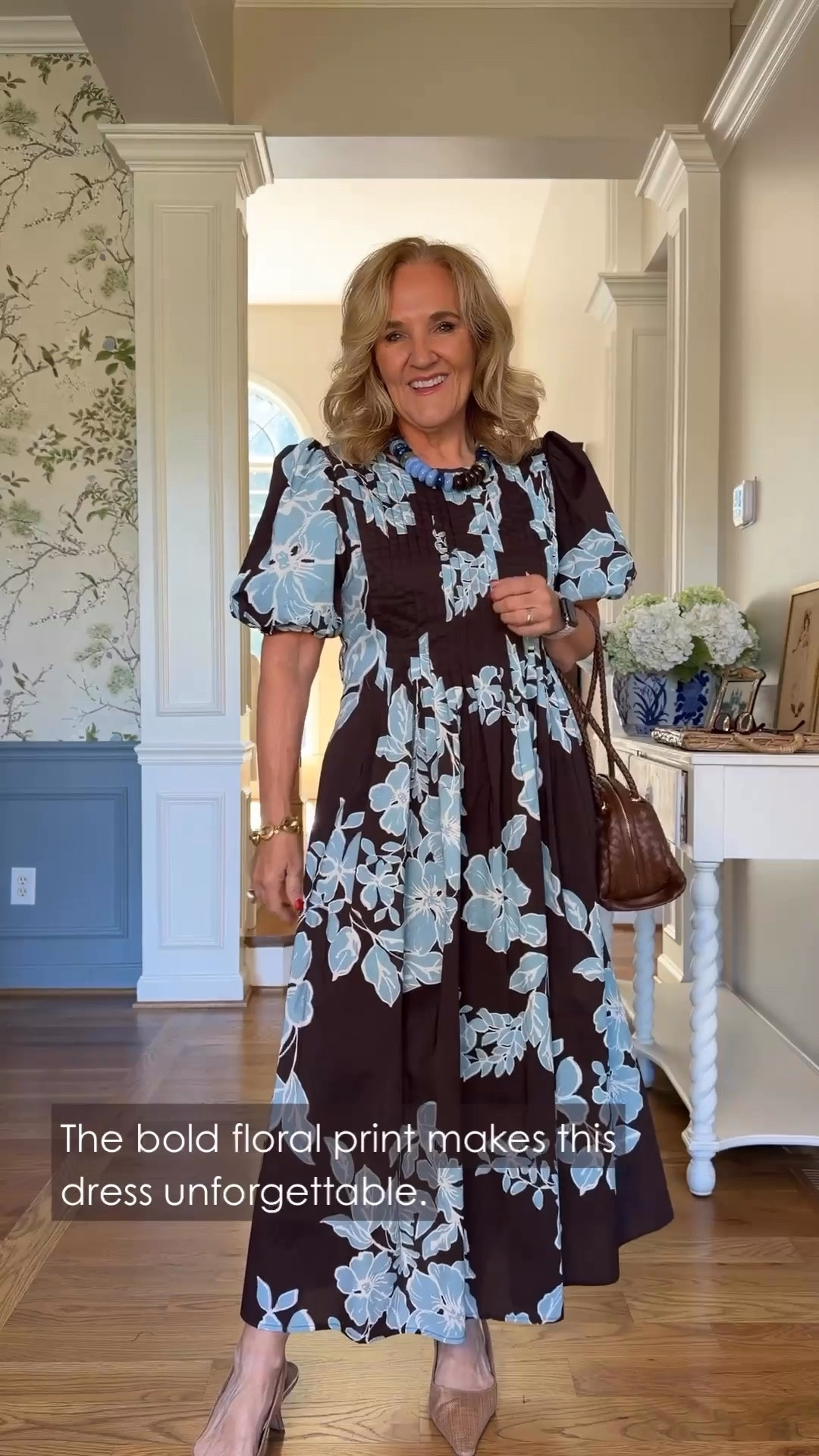 Gotta say, this dress caught my eye! The blue florals against that deep brown are a little unexpected, and I think that's what makes it so good. I'm wearing a medium.