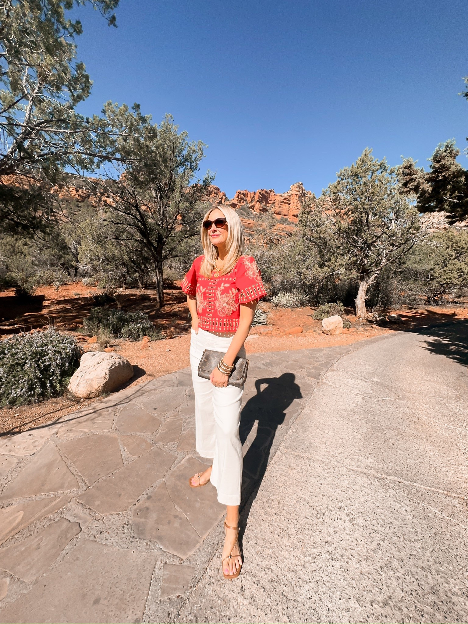 Spring outfit idea. I love this eyelet detail top and cropped wide leg jeans  

#LTKSeasonal #LTKStyleTip #LTKOver40