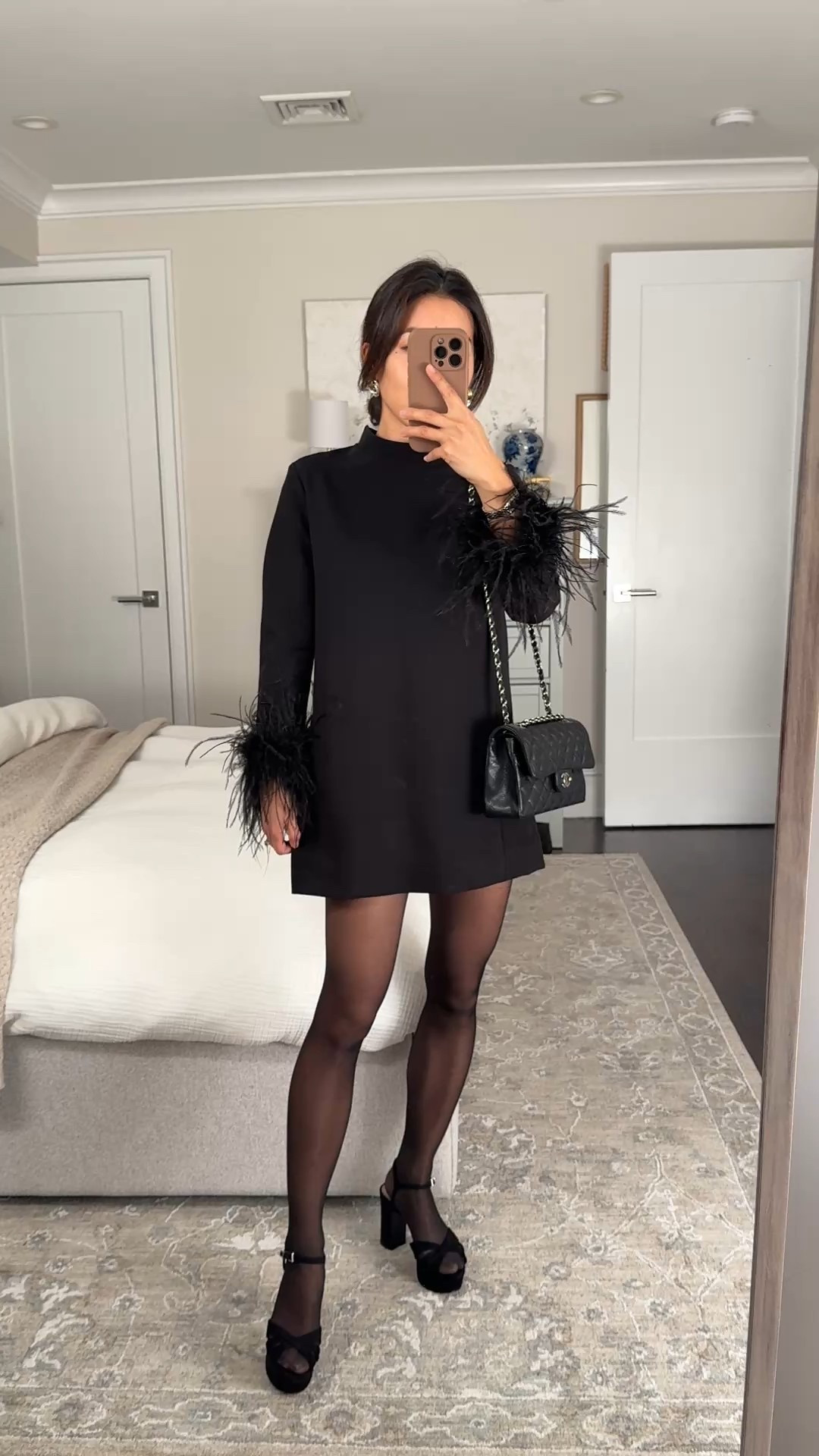 A favorite chic, classic yet very fun little black dress on sale!

party / holiday / new years eve style

• tuckernuck Feather trim sheath dress size xxs hemmed. Thicker, nice quality structured fabric with a full lining and pockets! Zipper back and Velcro adjuster at the neck. Bracelet length sleeves work well for petites. Length hits above the knee on me (5ft) and is modest for an office party or work event but I got this hemmed maybe a tad too short 

• Schutz platform sandals 5.5 (size up if between sizes) super lightweight I also love in tan

• Heaven Mayhem earrings

Petite friendly, winter wedding, New Year’s Eve party, family photos dress

#LTKWedding #LTKPetite #LTKHoliday