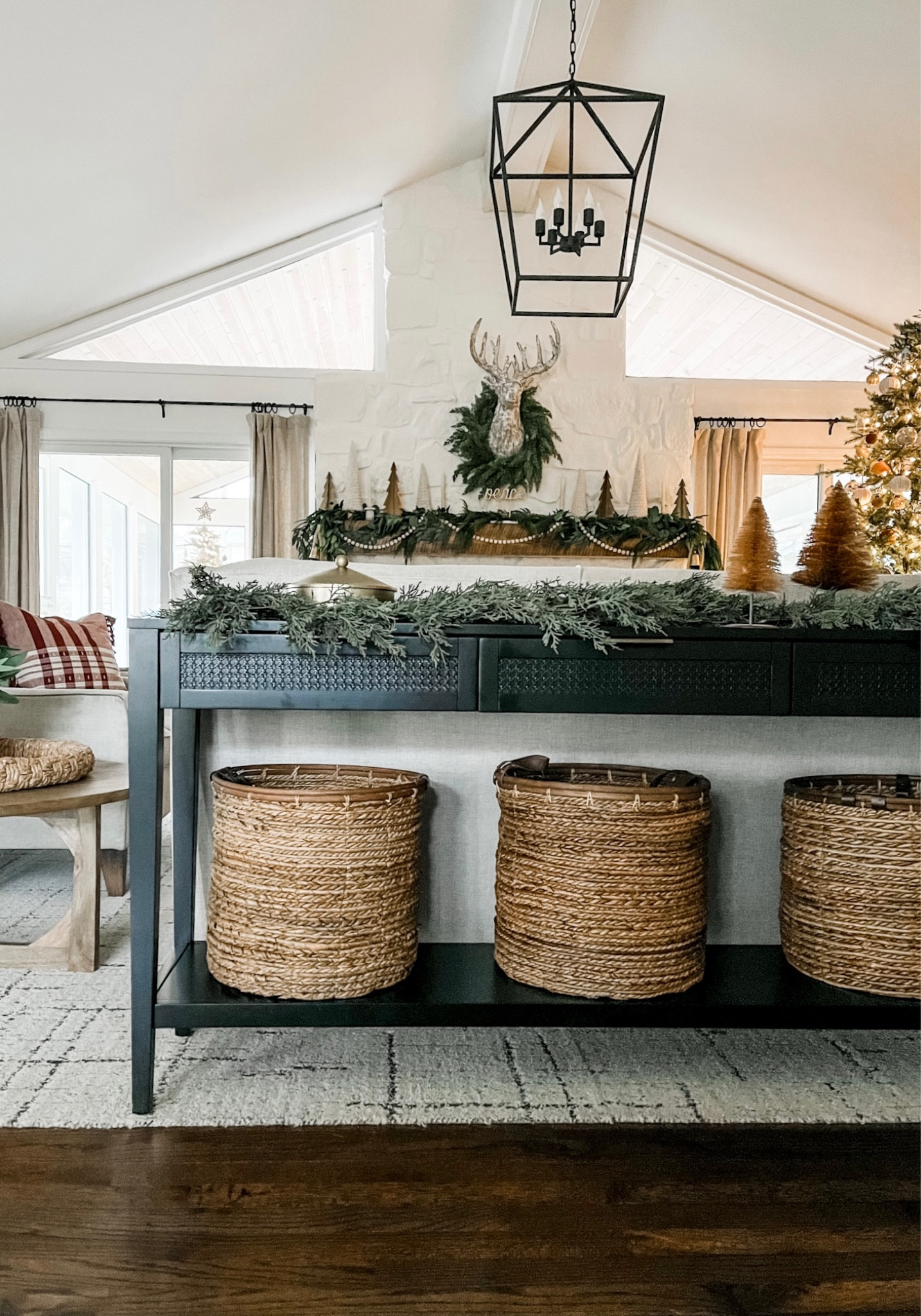 This is the best budget console table and it is back in stock! 

#blackconsoletable #wovenbaskets #garland #budgetconsoletable 

#LTKstyletip #LTKHoliday #LTKhome