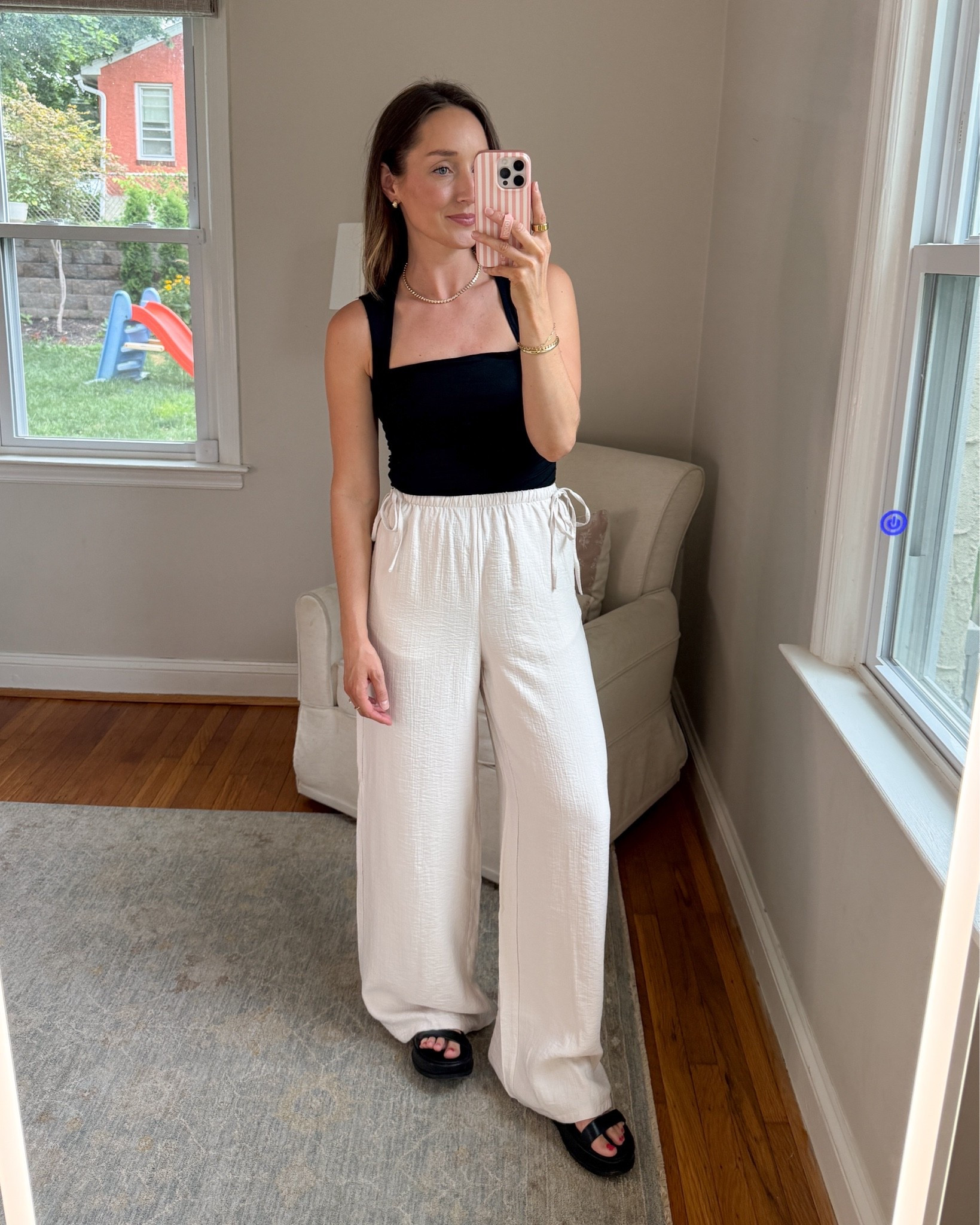 These are the pants version of the modern gauze shorts. They have cute ties on the side and run a little long. The inseam was 31 inches on an XS when I measured it. Tank runs large. Wearing an XS.