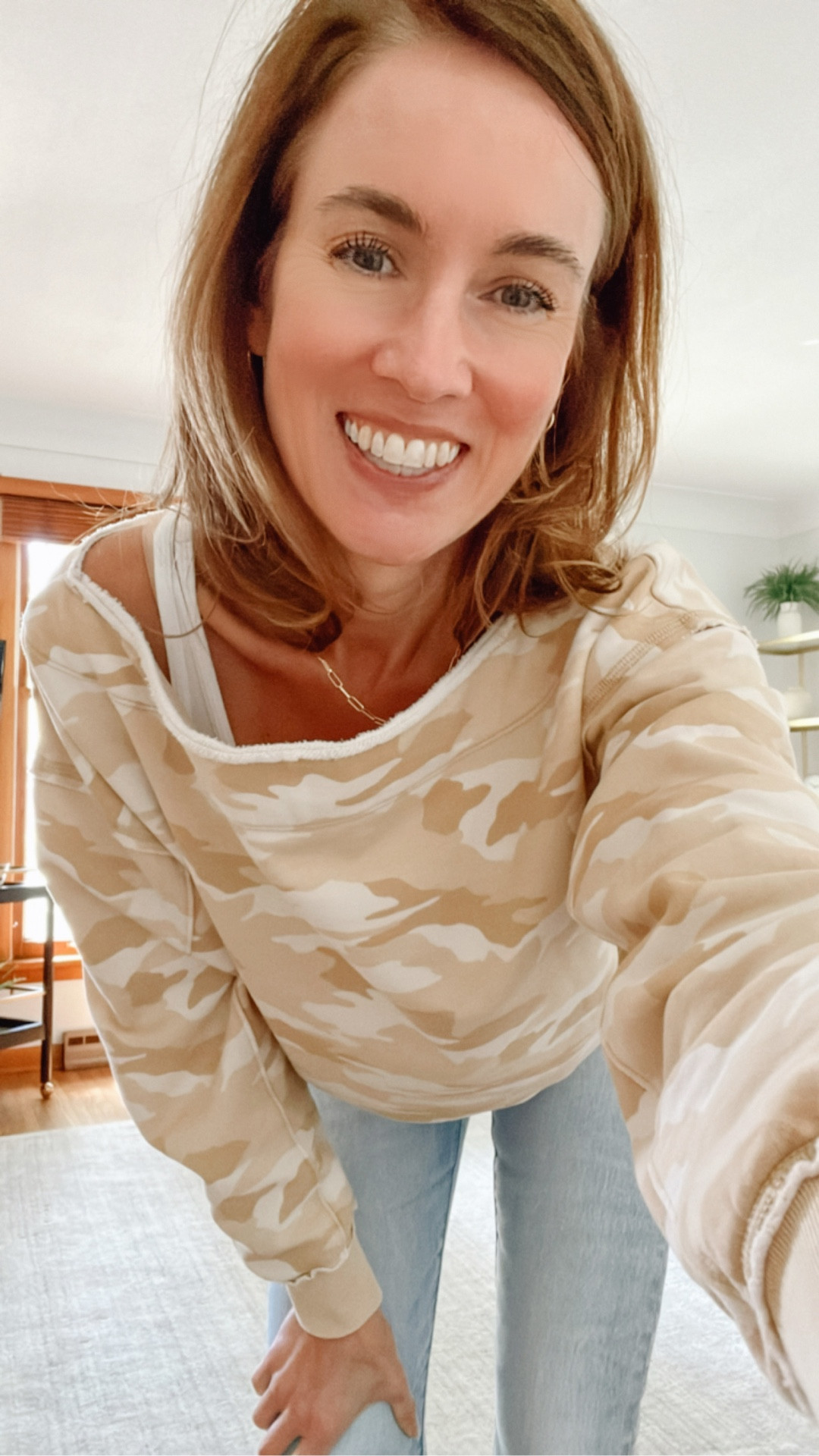 What I am wearing: Camo print sweatshirt from American Eagle (TTS - wearing XS) for only $11, Levi's Tango Light Straight Skinny 501 jeans from Zappos (TTS - wearing size 24), Gorjana gold chain necklace, BaubleBar huggie gold hoop earrings. #over40style #fitcheck #aejeans #zappos #gorjana #over50style


#LTKOver40 #LTKSaleAlert #LTKFindsUnder50