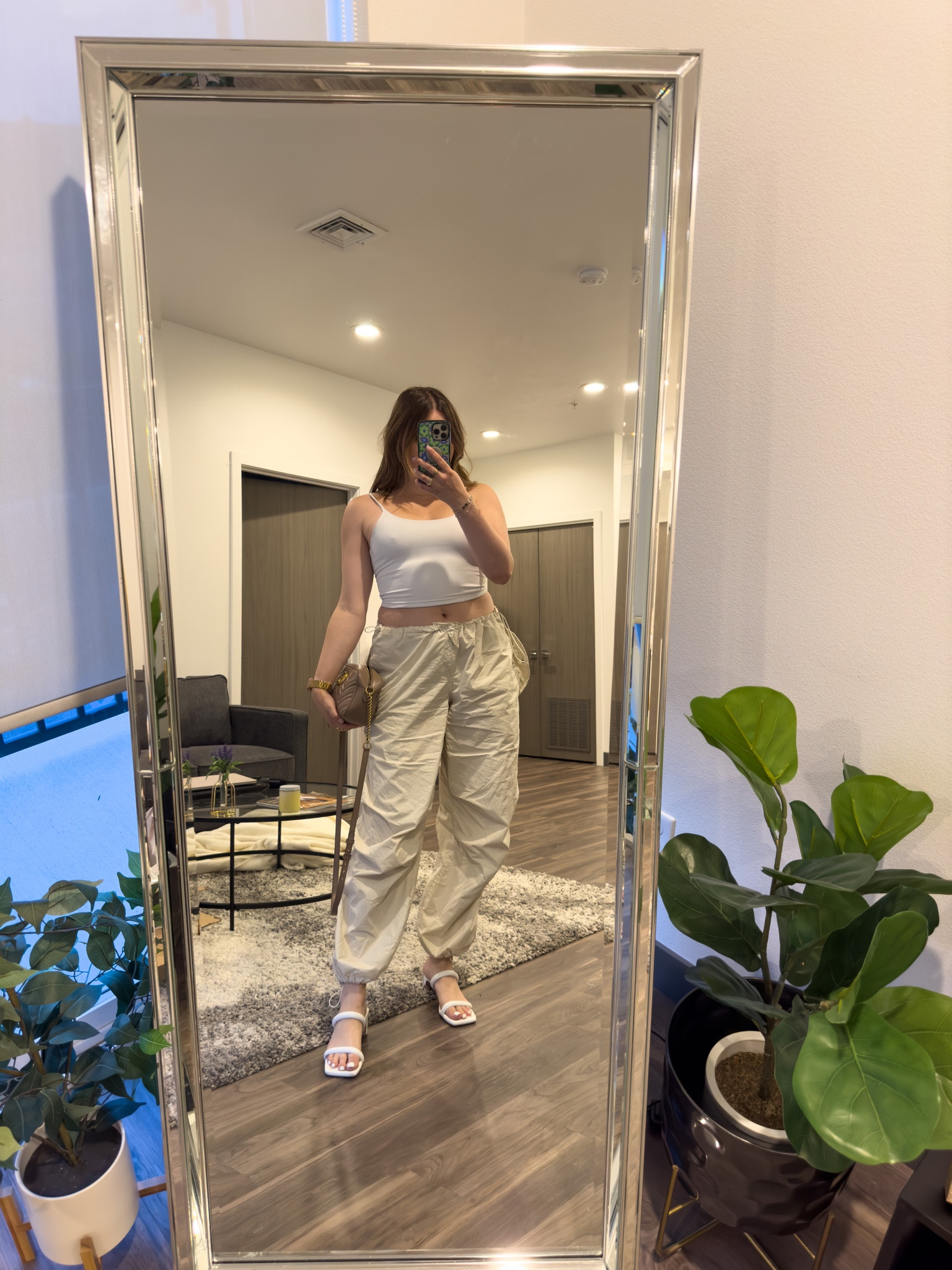 Casual girls night out outfit! Featuring the best cargo and parachute pants. 

I’m wearing a M tank, size L pants and size 9 sandals

#LTKSeasonal #LTKunder100 #LTKstyletip