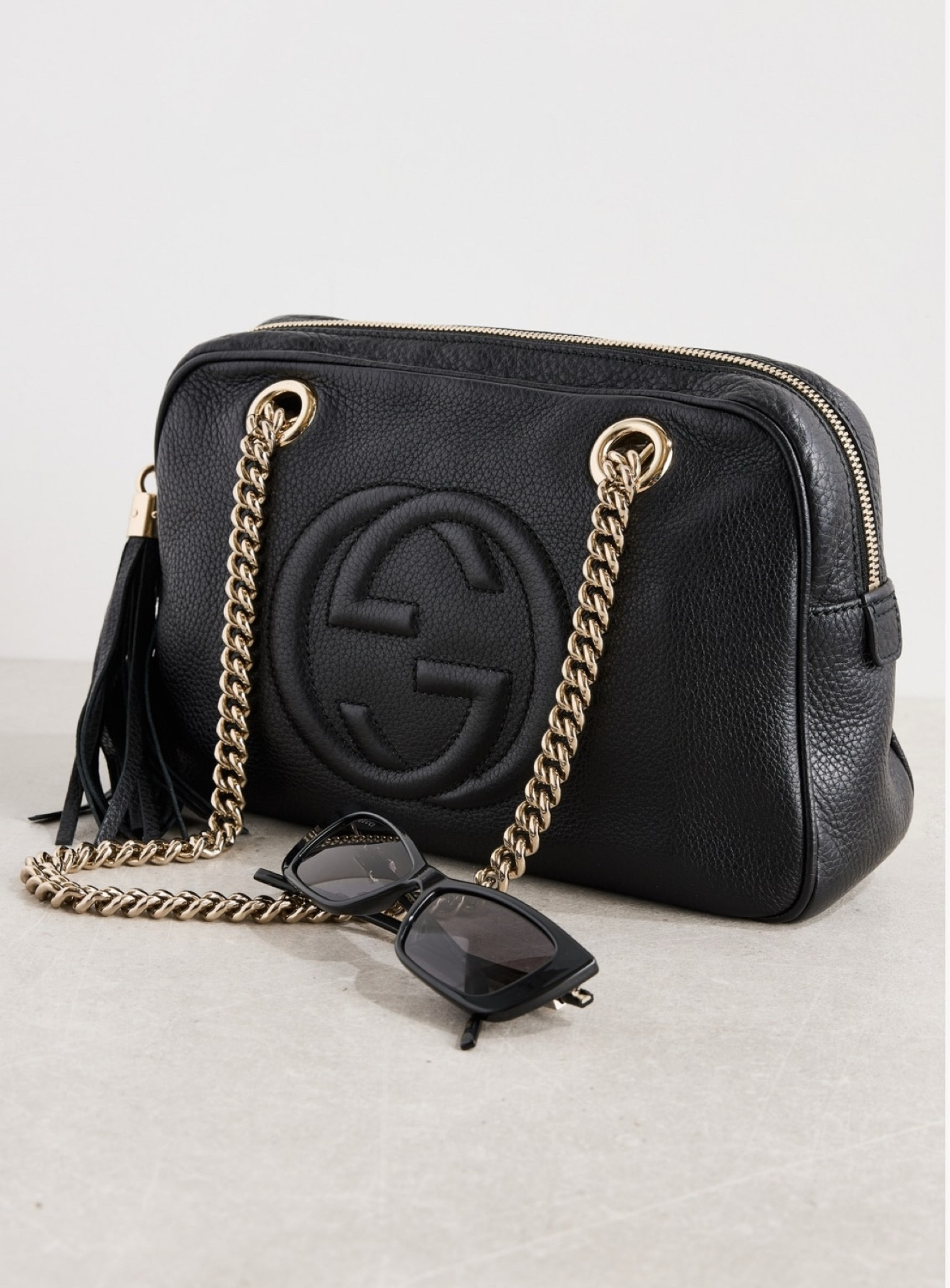 Timeless elegance meets everyday luxury with the Gucci Soho Chain Shoulder Bag. Perfectly sized and effortlessly chic, it’s your go-to accessory for any occasion. 

#LTKbag #LTKgiftguide #LTKstyletip
