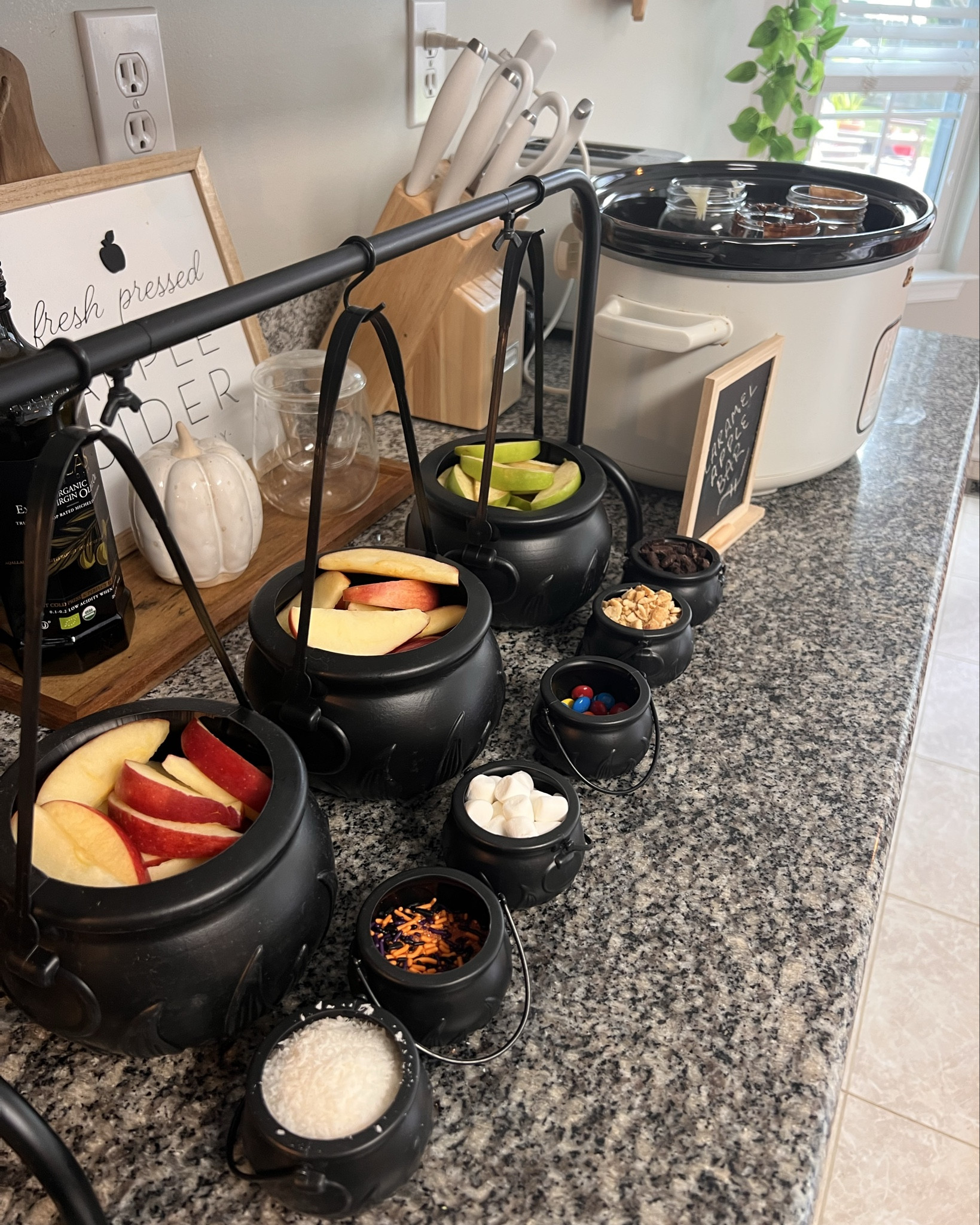 This fun cauldron setup was perfect for a caramel apple bar with toppings! So festive and fun for a Halloween event 🥰👻🎃

Halloween Hosting, Halloween Party, Cauldrons, Serving Cauldrons, Party Finds, Caramel Apple Bar, Amazon Finds

#LTKHalloween #LTKFindsUnder50 #LTKHome