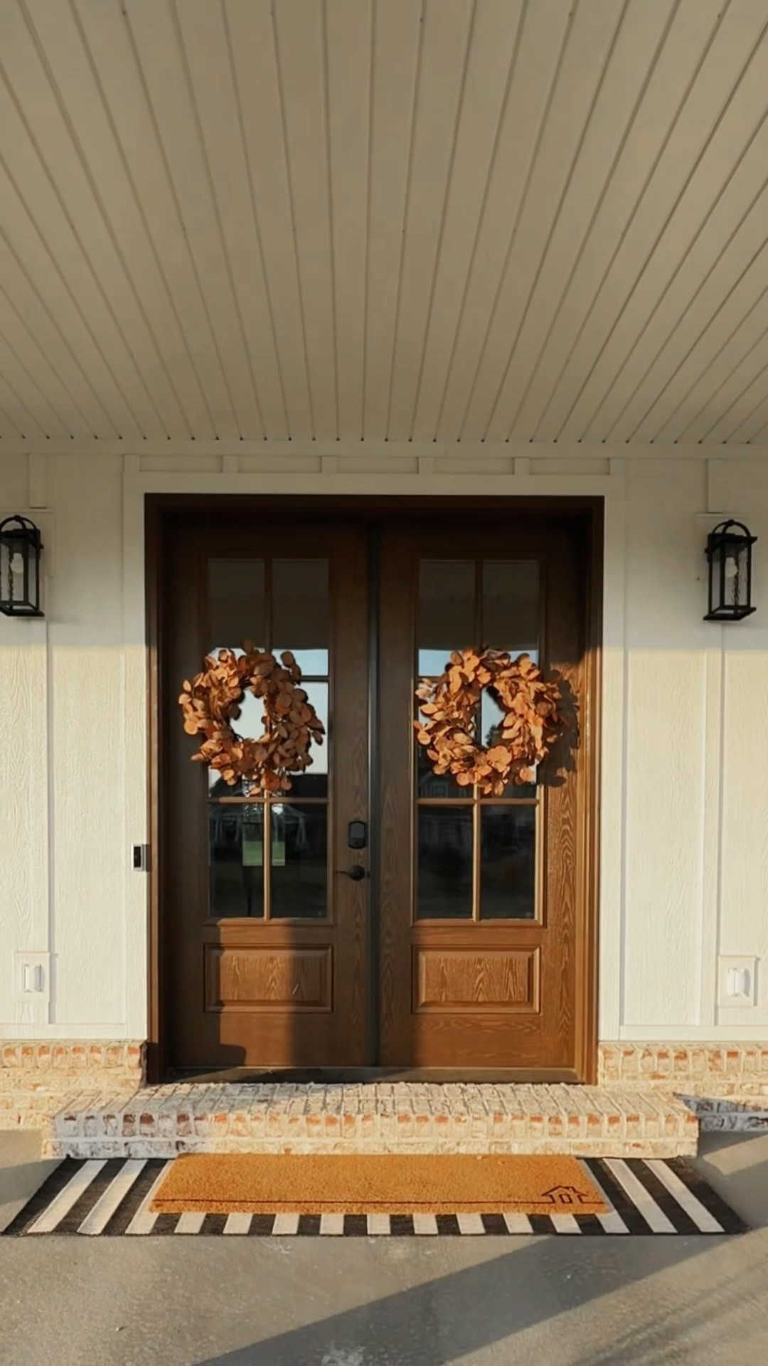Adding these rusted eucalyptus wreaths to the doors transported the porch straight to fall! Find them in the Hearth and Hand with Magnolia section at Target!

#LTKautumn #LTKFindsUnder50 #LTKSeasonal
