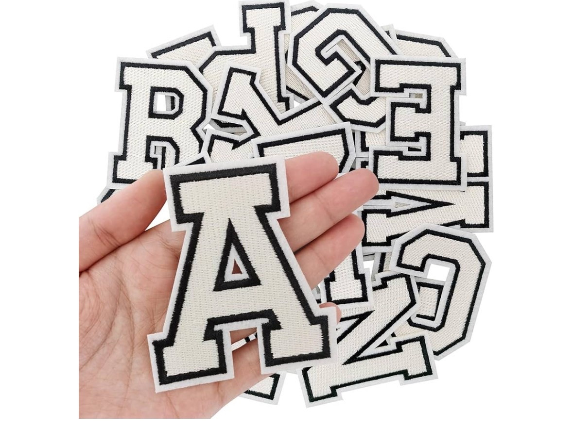 Simple white iron on letters 

#LTKFamily #LTKBaby #LTKWedding