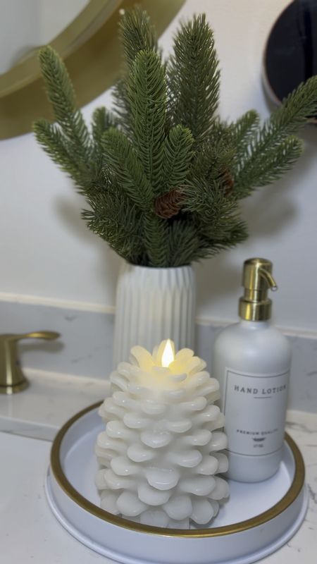 Styled this beautiful flameless pinecone candle in my bathroom for the christmas holiday season! 
Holiday winter themed flameless candle decor 🎄 | decor | christmas decorations | bathroom decor #amazonfind #amazonhome 

#LTKHoliday #LTKfindsunder50 #LTKSeasonal
