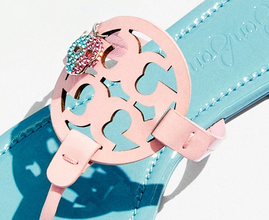 TB X BONBON MILLER PATENT CHARM SANDAL

It’s the summer of sweet, sour and salty with a limited-edition Tory Burch x BonBon collaboration. Our iconic Miller sandal is updated in contrast patent leather and detailed with a pavé-embellished skull, inspired by the confectioner’s sugar-coated sour skull candy, a Tory favorite. The original sandal — loved for its timeless style and exceptional comfort — features a softly padded insole, visible stitching and a laser-cut logo with hand-painted edges. Delivered in exclusive packaging in signature BonBon pink

#LTKParties #LTKShoeCrush #LTKStyleTip