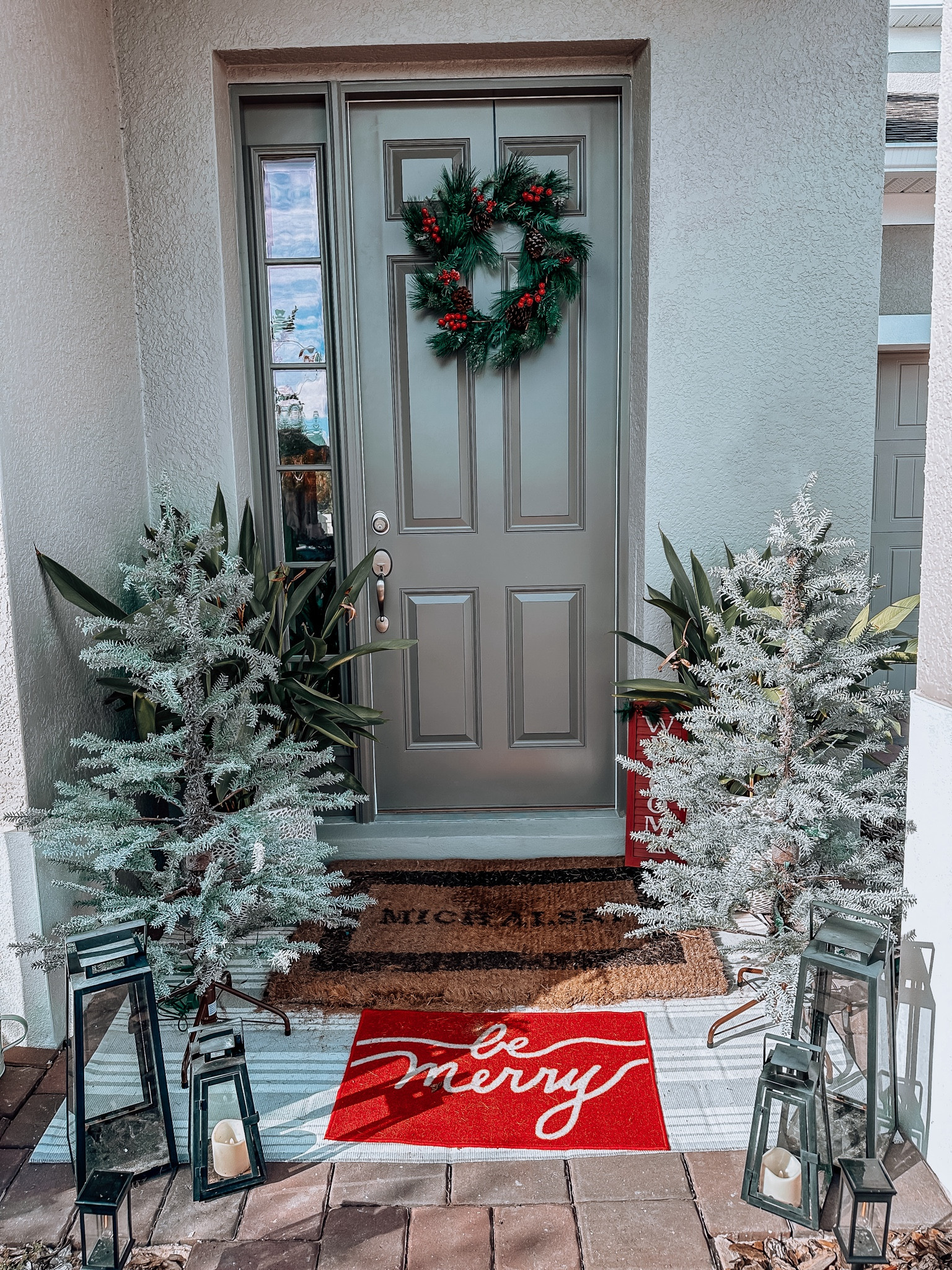 christmas decor front door entry walkway merry trees lanterns design 

#LTKSeasonal #LTKhome #LTKHoliday