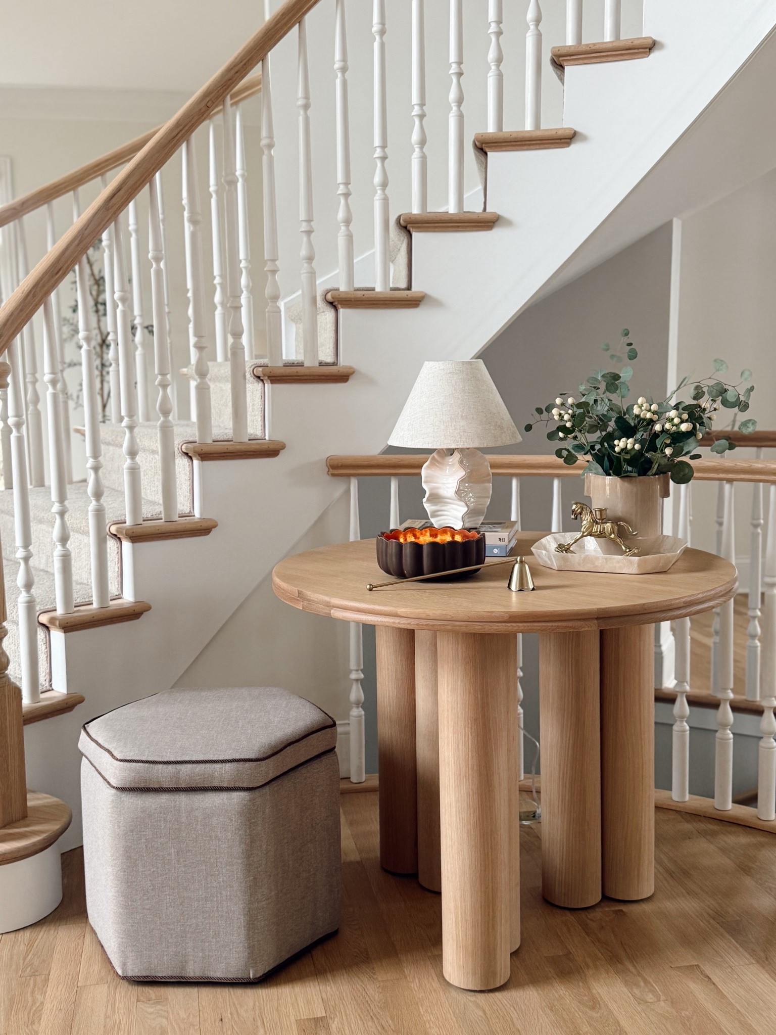Entryway Refresh ✨🌿 switched up the decor on my table a little with a bit of new and a little bit old!

+ added in this new beautiful ottoman with hidden storage inside! Love the hexagonal shape, brown piping detail, and functionality 
+ new Target coastal lamp
+ new Target tray
+ older Target vase
+ vintage horse object from Etsy
+ candle and snuffer also from Target 
+ fresh eucalyptus and berry stems from Trader Joe’s! 

I’m loving it 🥰 now trying to decide if I should have one ottoman here or two? What do you think? 1️⃣ or ✌🏼?!



#LTKFindsUnder100 #LTKHome #LTKFindsUnder50
