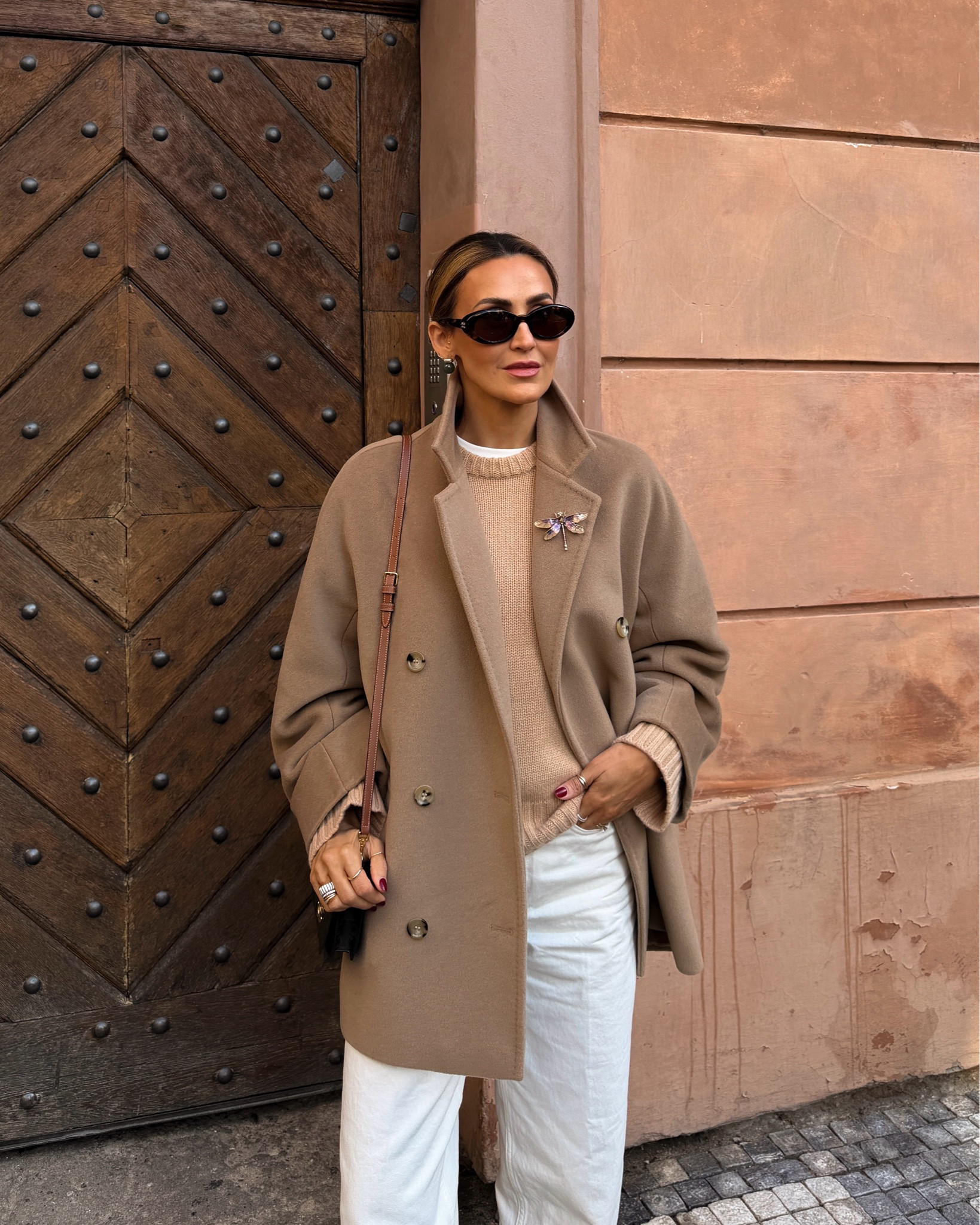 What I wore to our last day in Prague ✨🤎 whoever said neutrals are boring?! 
Thes etrouser like jeans are perfect to wear with loafers, oversized cashmere knit (linking a similar style) size small
Coat size 38, I recommend sizing up for a chic slouchy fit! White oversized tee underneath it all.