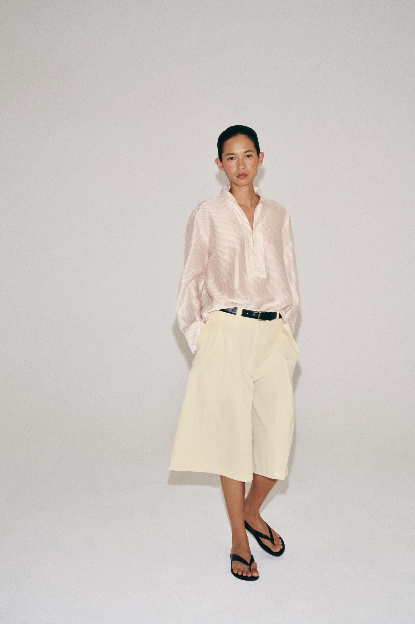 ZARA WOMAN COLLECTIONShirt made from a lyocell blend yarn. Featuring a regular collar and long cu... | Zara UK