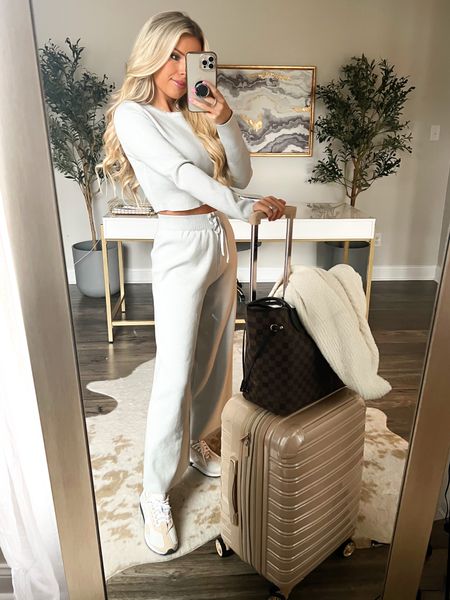 Airport outfit. Travel style. Airport style. Comfy travel outfit. Road trip outfit. Lounge set. Barefoot dreams cardigan. Luggage. Nike sneakers  

#LTKshoecrush #LTKtravel #LTKstyletip