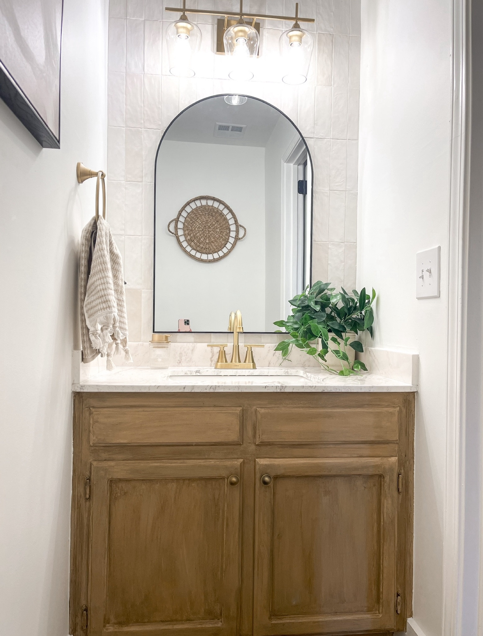 My arched mirror in my 1/2 bath is on major sale this week- just $45!!!
Also comes in gold 

#LTKSummerSales #LTKHome #LTKSaleAlert