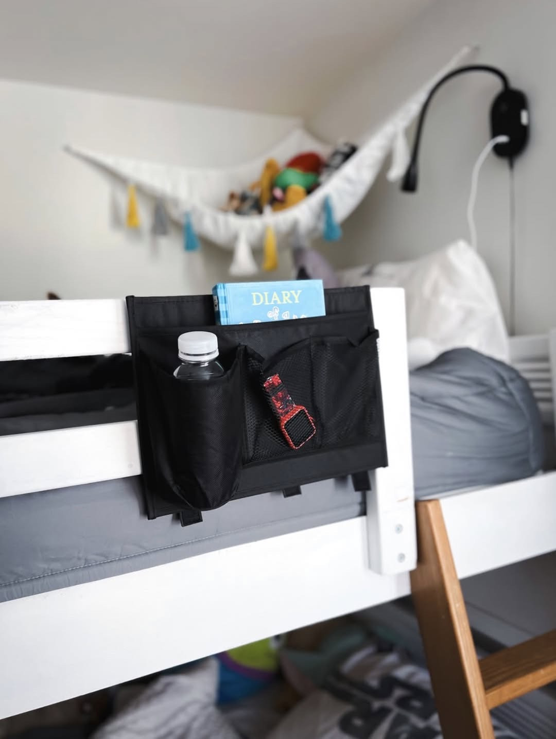 I bought this bunk bed organizer for Anthony and now of course Owen wants one too. This is a great place for him to store his watch, books and a bottle of water at bedtime!

Bedside caddy
Bed organizer pocket
Hanging bed storage
Bed frame organizer
Bedside storage pouch
Remote control holder
Mattress side organizer
Dorm bed organizer

#LTKSeasonal #LTKSaleAlert #LTKHome