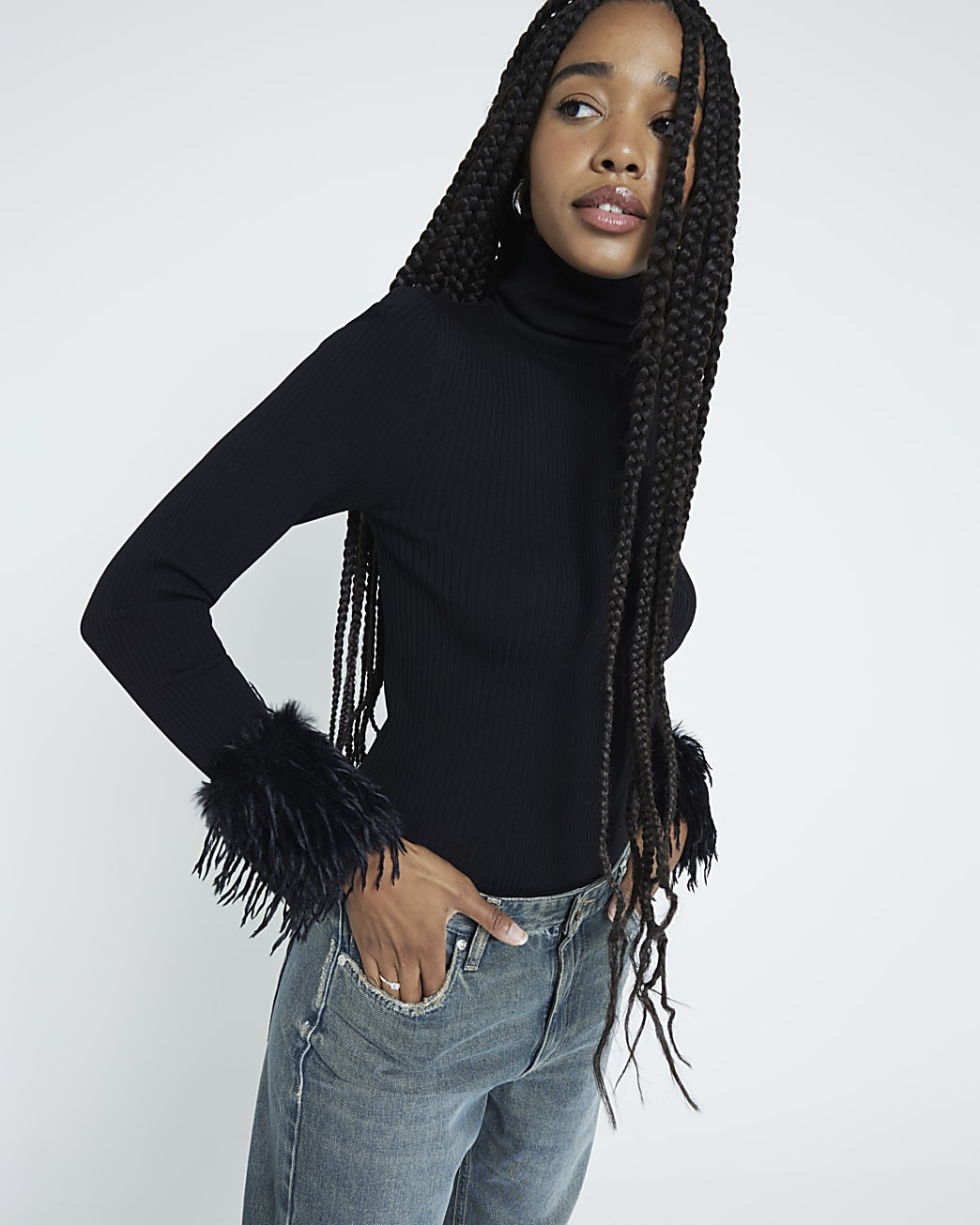 Black Long Sleeve Feather Cuff Roll Neck Top | River Island (UK & IE)