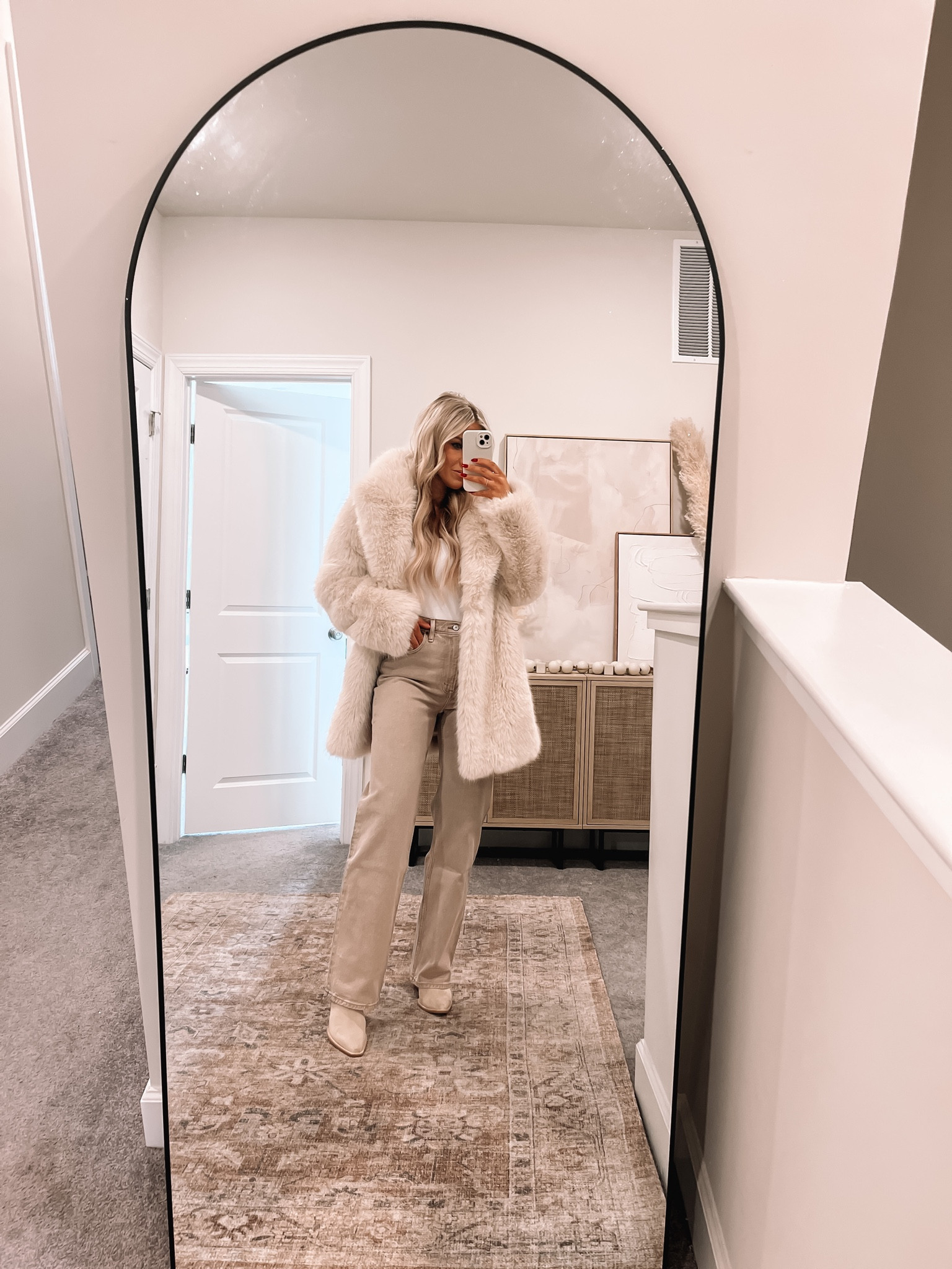 Light tan colored denim and a big furry jacket! I lovvve this look for winter. So chic and kinda western! Got my true size 27 regular. 

#LTKSeasonal #LTKfindsunder100 #LTKstyletip