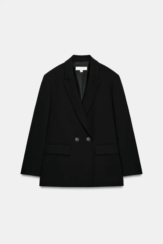 Oversize blazer with a regular collar and long sleeves with shoulder pads. Featuring front flap p... | Zara UK