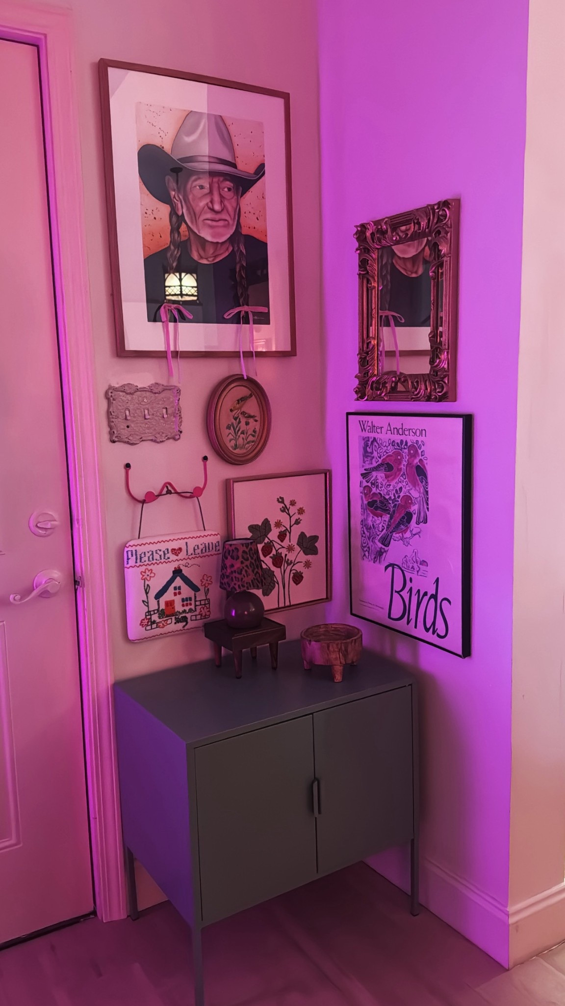add a corner storage cabinet by the door for purse, shoes and keys :)
most of the wall art is vintage, thrifted or home goods 🫶🏻