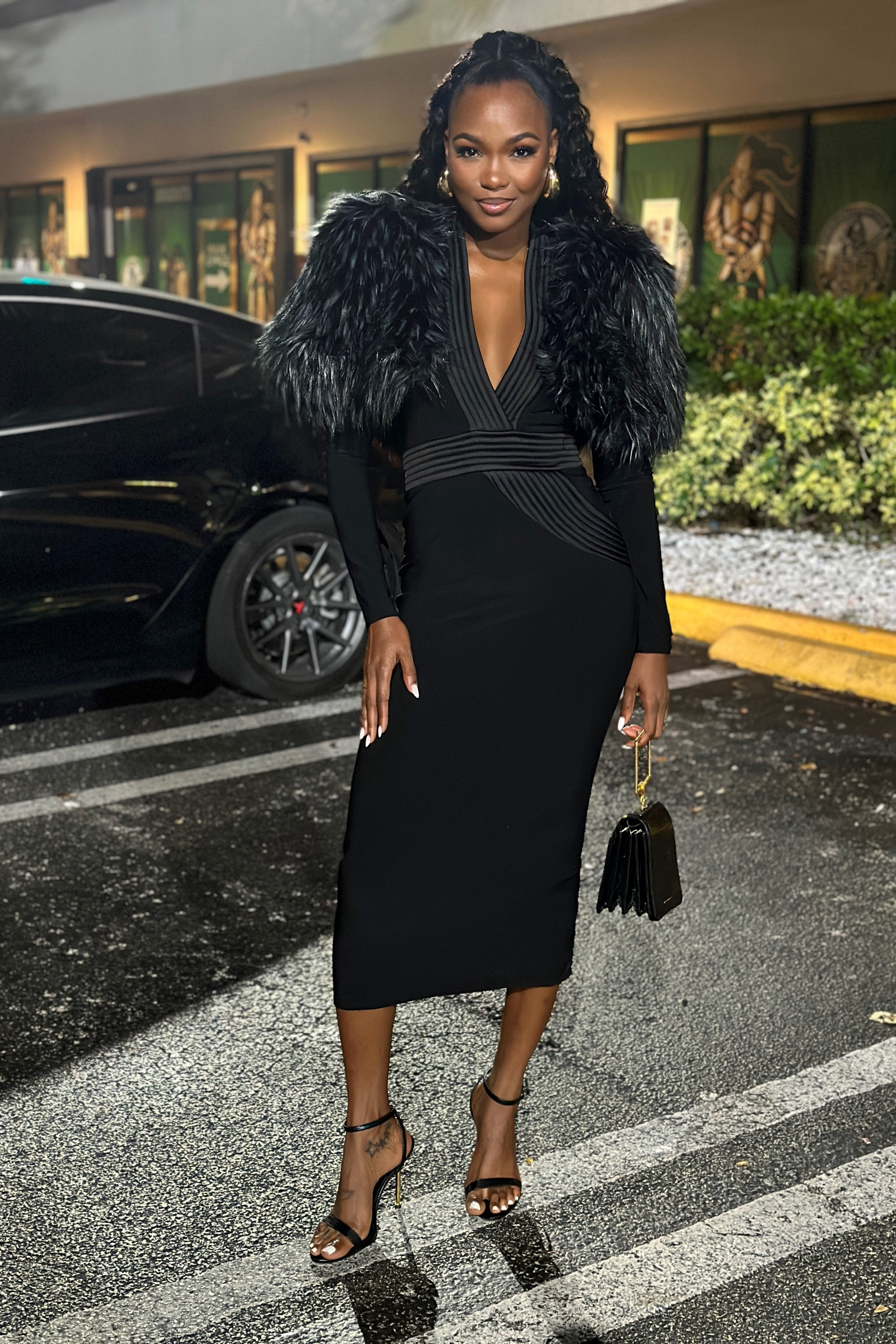 This dress is sold out. But here is one from the same designer