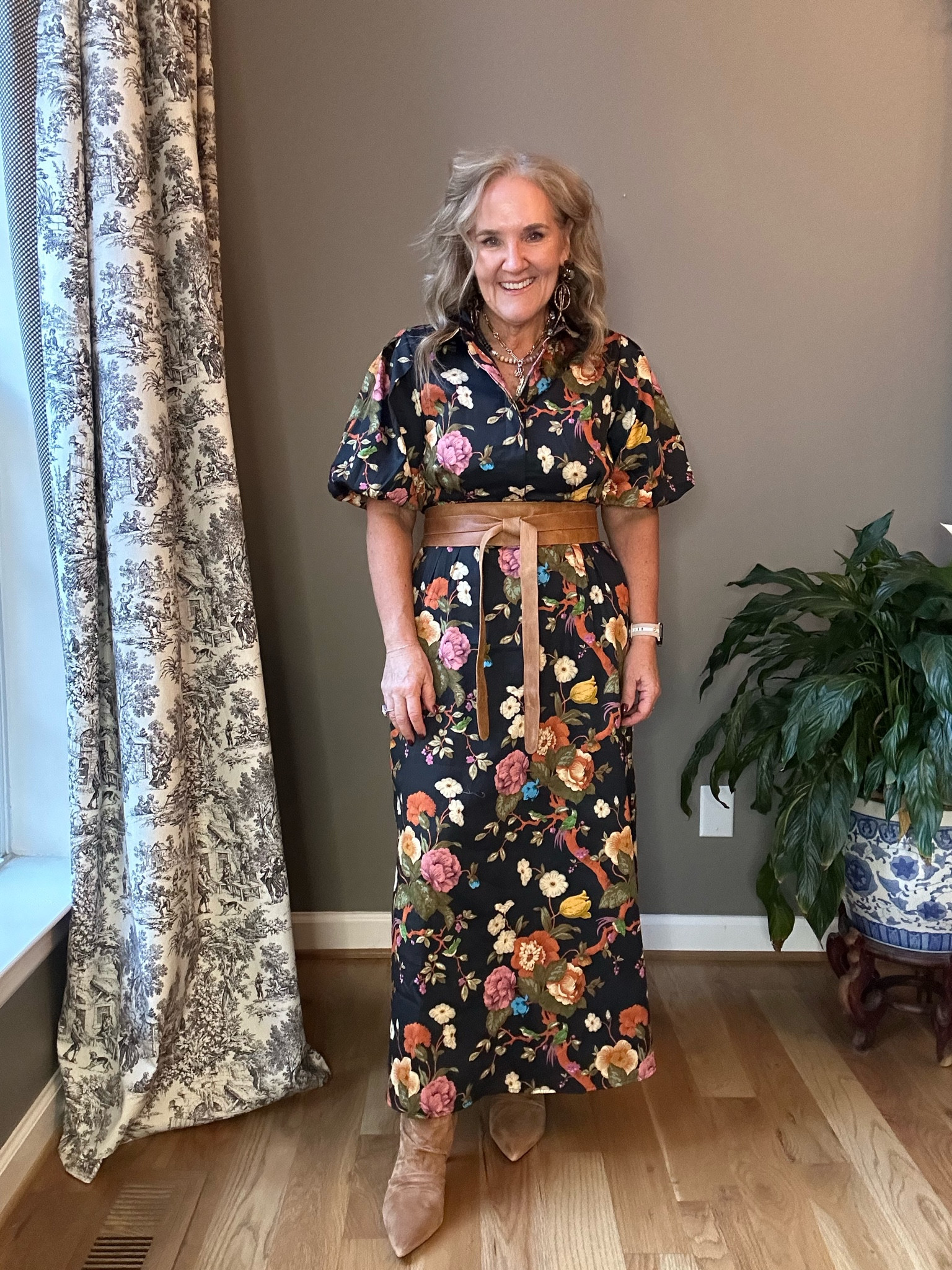 Cotton sateen floral maxi dress. Fully lined spectacular quality. Would be beautiful for a fall wedding or dressy or fall event, I added a belt and booties for a bit less formal look for a dinner event I have tonight. I I did order my larger size, but unless you were a little thick in the middle, you don’t need to. It buttons just to the chest and there is a side seam zipper for easy on and off.

These suede booties are so comfortable what we expect from Dolce Vita true to size I always size up a half an a pointed toe boot. My belt is an Argentine leather belt and excellent quality. You’ve seen me wear them before and it just transforms an outfit. 

Dress wedding guest dress fall wedding guest dress floral dress, black floral dress, brown belt, caramel brown boots, suede booties ankle booties 

#LTKWedding #LTKOver40 #LTKMidsize
