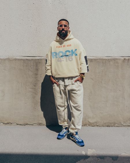 FEAR OF GOD x RRR123 Hoodie in ‘Cream' (size 2). FEAR OF GOD 3/4 Sleeve Henley in ‘Heather Oatmeal’ (size M). FEAR OF GOD x BARTON PERREIRA glasses in ‘Matte Taupe’. ESSENTIALS sweatpants in ‘Eggshell’ (size M). ADIDAS Originals TRX Vintage sneakers in ‘Blue’ (size 9.5 US). A relaxed and elevated men’s look that warm tones and that’s perfect for a Spring/Summer day out. 

#LTKmens #LTKstyletip