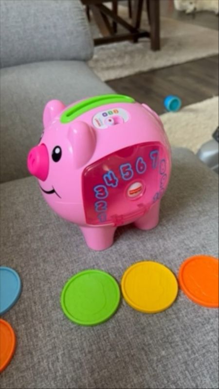 Our daughter LOVES this piggy bank toy! She has really perfected inserting the coins into the thin slot and counting up to ten with the piggy counting as she inserts the coins. There are 5 different color coins too, so they can also learn to differentiate colors from this toy.

#LTKbaby #LTKkids #LTKVideo