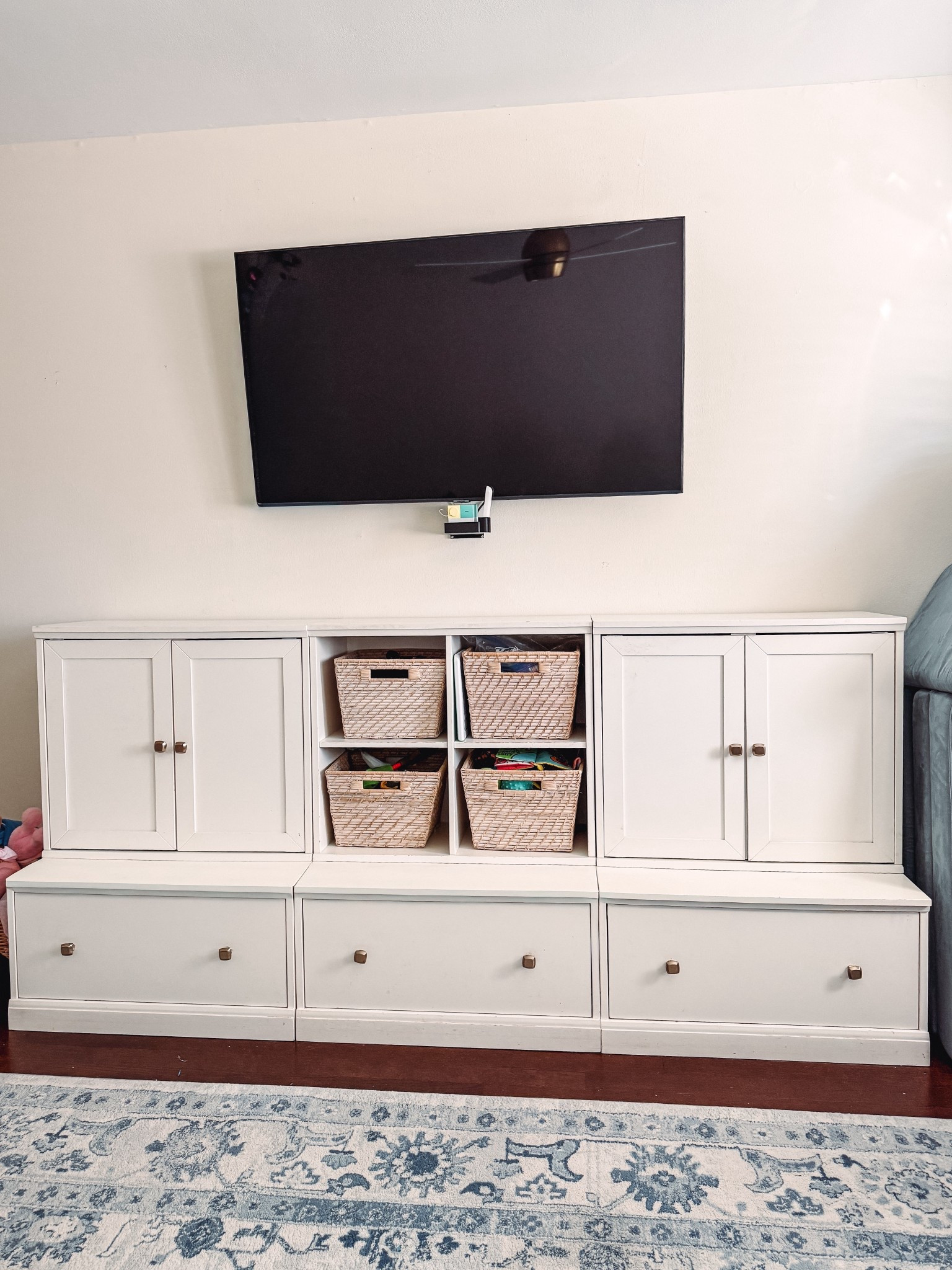 But where will we store all of these new toys?! 😅

We’ve had this modular storage system for 6 years and just moved it into the playroom in our new house (we moved a month ago and I definitely haven’t had time to fully style the playroom post-Christmas 🫣). It honestly stores so much and works perfectly for my kids ages 19 months to 6.5 years — and everyone in between.

My kids are pretty rough on furniture, and I’m genuinely impressed with how well this has held up over the years. One of my favorite things is that you can close the doors and drawers, because let’s be honest… my kids are not great at putting things back perfectly 😅. Instant visual calm.

I did swap out the knobs to give it a more elevated look, which made such a difference. Linking the knobs I used and the baskets we love — both have been total workhorses for us!

#LTKHome #LTKKids #LTKmomlife