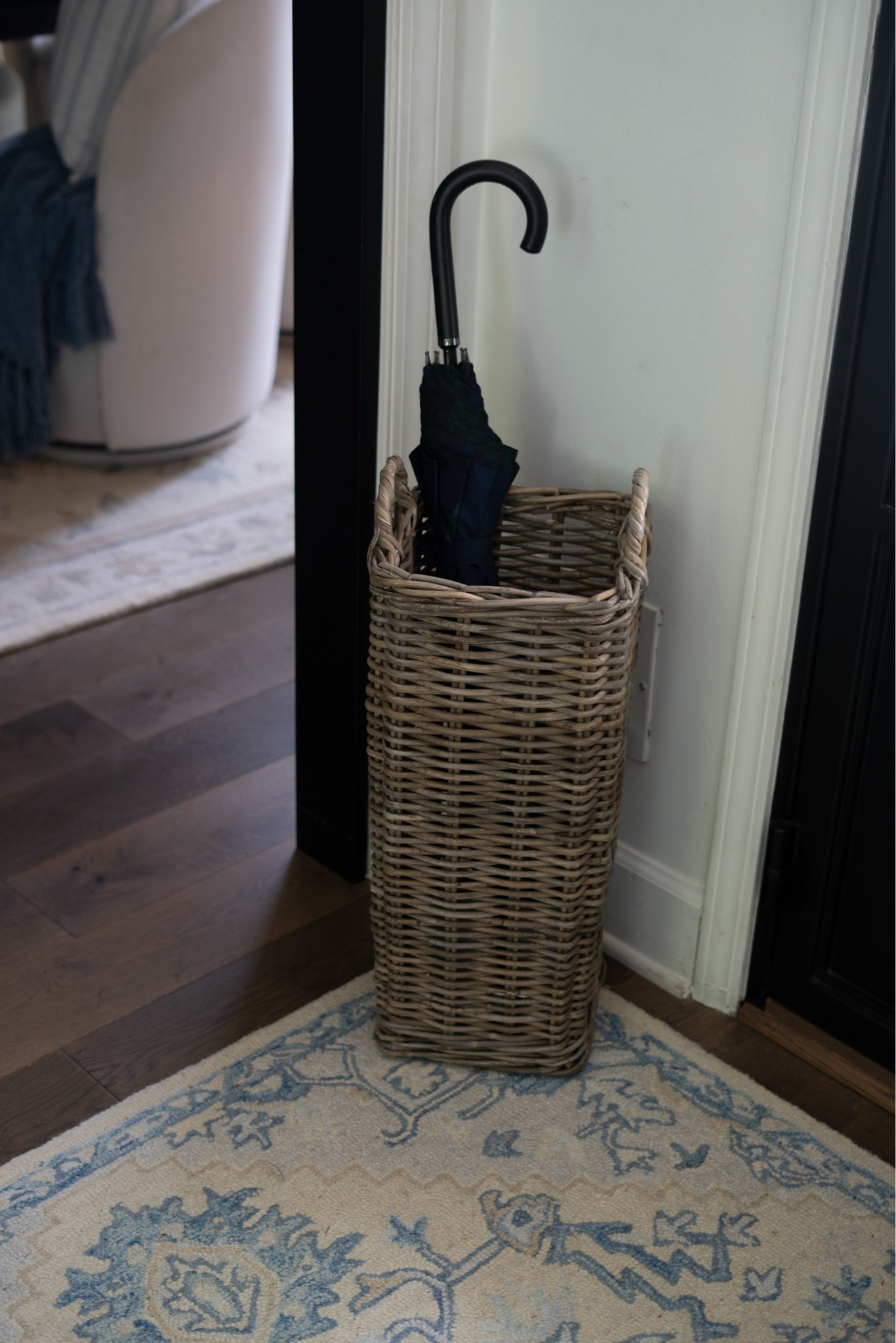 Wait… the way I got SO excited over this find. The perfect woven umbrella holder that keeps everything organized and actually looks beautiful in the space. Functional and aesthetic is always the goal.