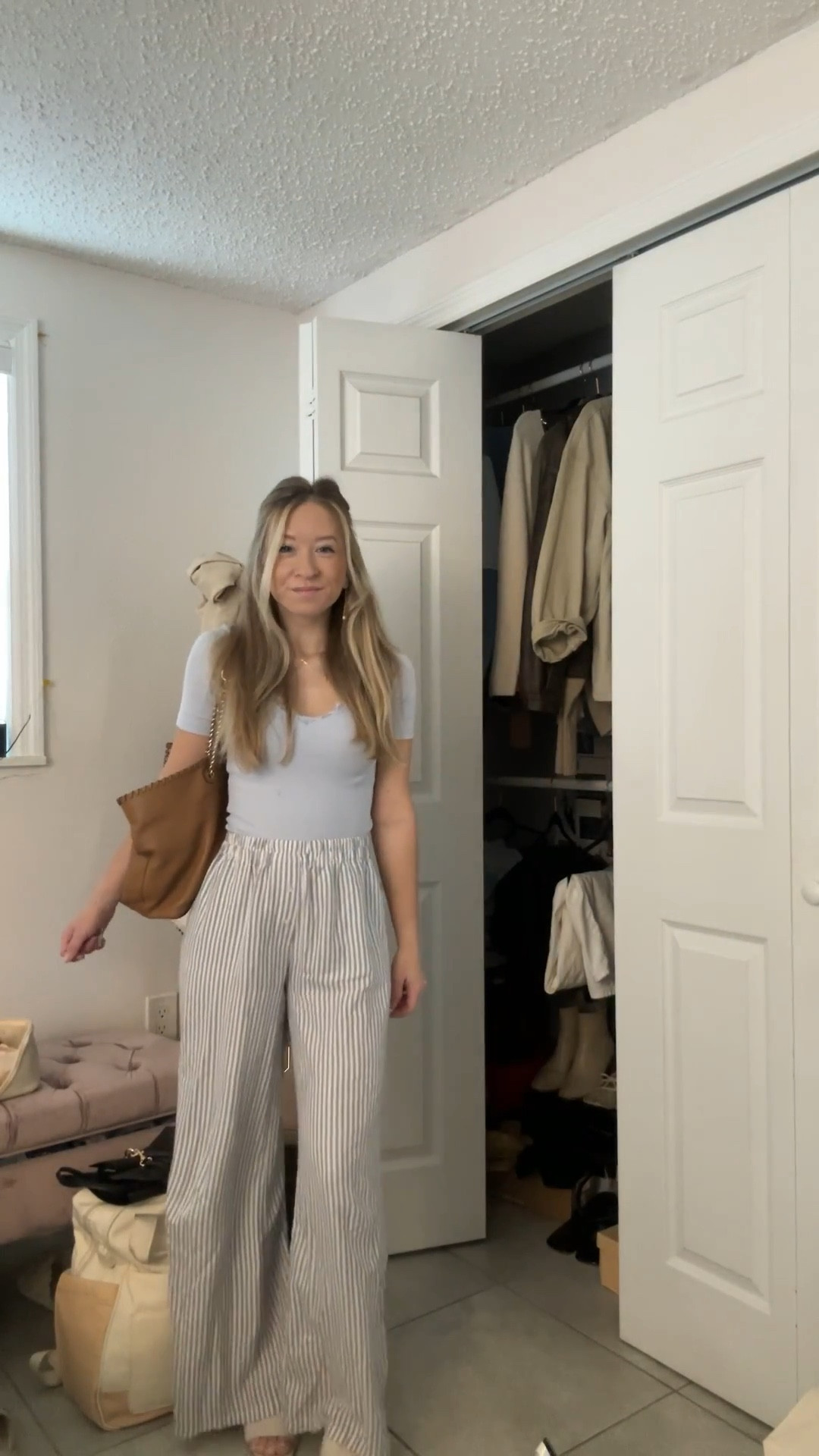Casual summer outfit wearing blue striped pants and lace trim top🤍

#LTKootd #LTKdayinmylife