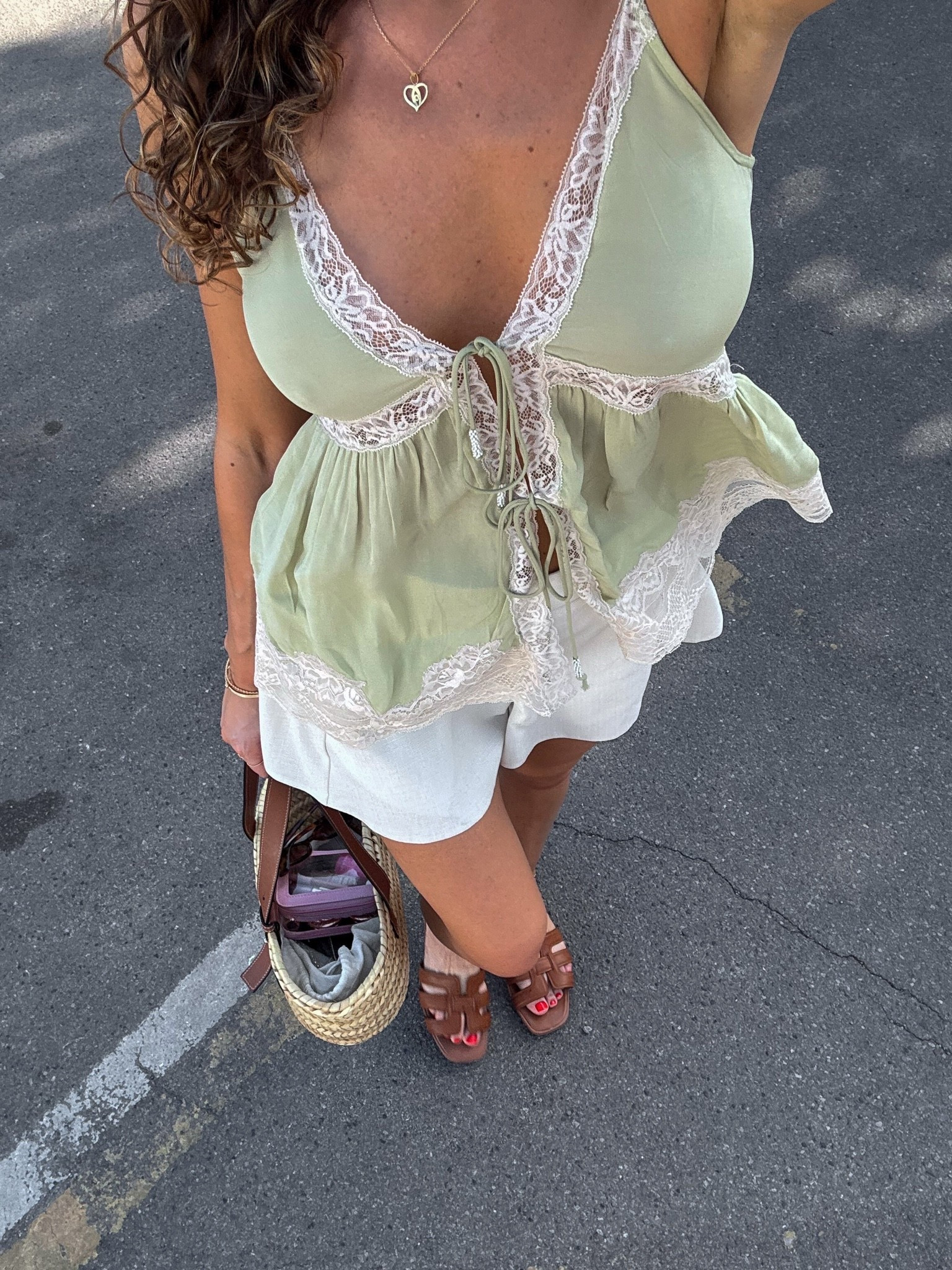 Heatwave outfit approved 🌞 The colour of this lace cami top is so gorgeous for summer and I love it paired with these brown tan sandals, Loewe basket bag and linen blend shorts 🤍

#LTKuk #LTKsummer