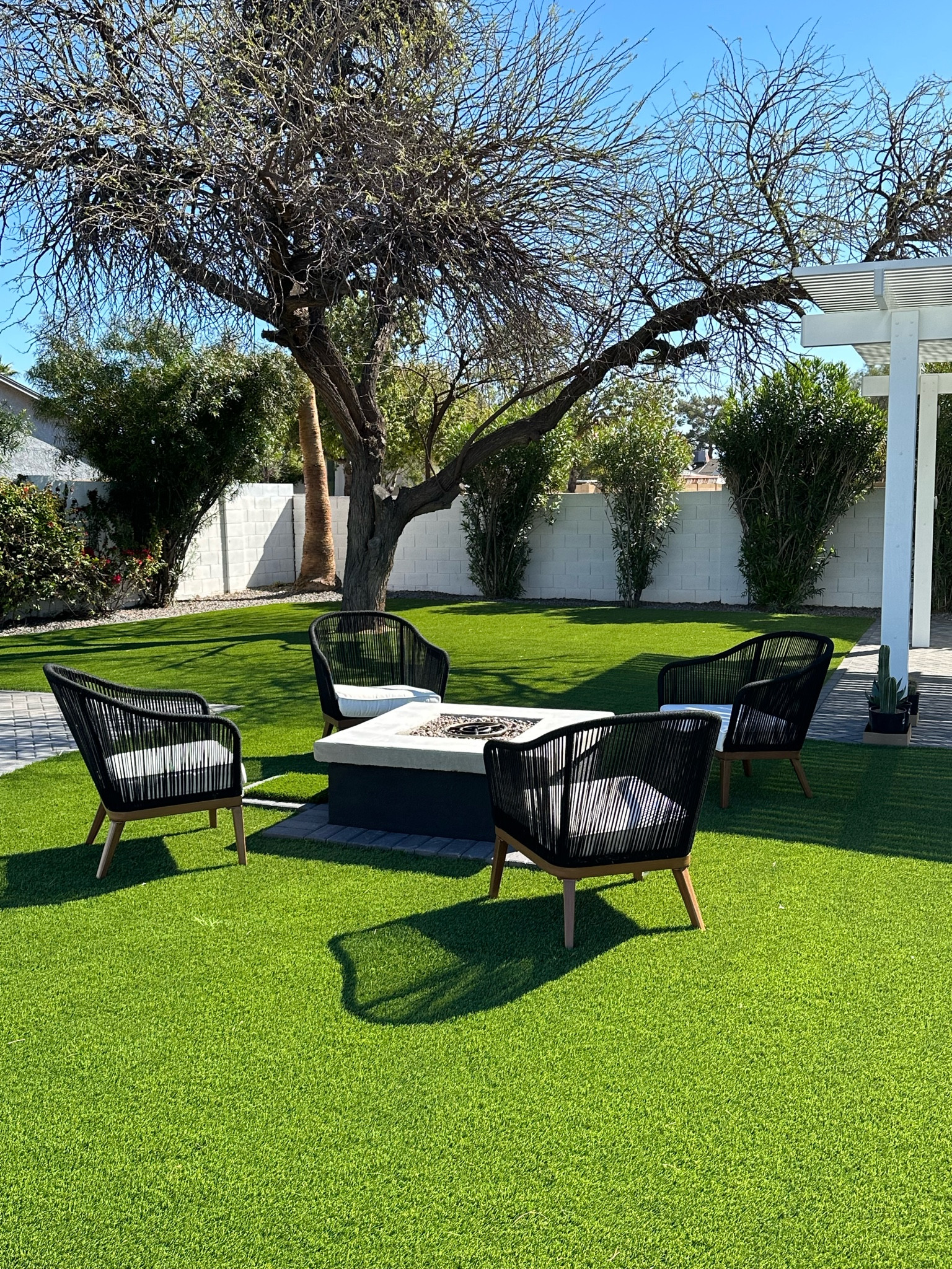 { AZ } Backyard RENO 

We added a fire pit and we are obsessed. Jason and I sit here in the mornings to drink our coffee and we are here enjoying this space in the evenings too. I'm still adding furniture pieces but these chairs are insanely comfortable. I'm thinking of adding a matching loveseat? What do you think... Should I add a loveseat in addition to the chairs? I need your help! 

#LTKSeasonal