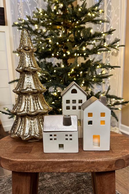 Christmas Vignette. Follow @farmtotablecreations on Instagram for more inspiration. How incredibly beautiful are these My Texas House holiday pieces? I absolutely love the gold glass tree. It has such beautiful details & it glistens amongst the lights while these adorable houses make for the perfect vignette.✨ They can easily accommodate a votive candle to add to the cozy glow. Best part, these items are all so incredibly affordable. Affordable Holiday Decor. Walmart Christmas Finds. Target Accent Table. King of Christmas Tree. Christmas Decor. Holiday Decor  

#LTKHoliday #LTKhome #LTKfindsunder50