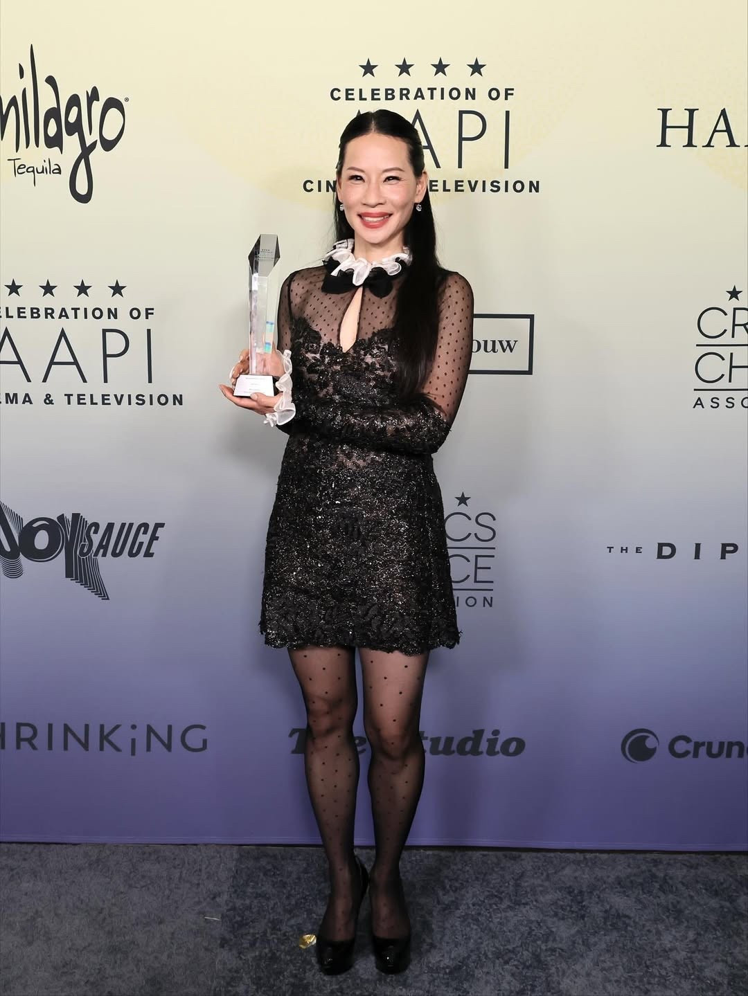 @lucyliu accepted the Trailblazer Award from @therock during the Critics Choice Association’s 4th Annual Celebration of AAPI Cinema & Television in Los Angeles, wearing a $6,162 (now $5,361) @giambattistavalliparis embroidered ruffled-collar dress. Hot! Or Hmm..?

📸: Getty Images
#LucyLiu #lucyliufbd #lucyliustyle #DwayneJohnson #dwaynejohnsonfbd #fashionbombdaily #fbdaily #BombStyle