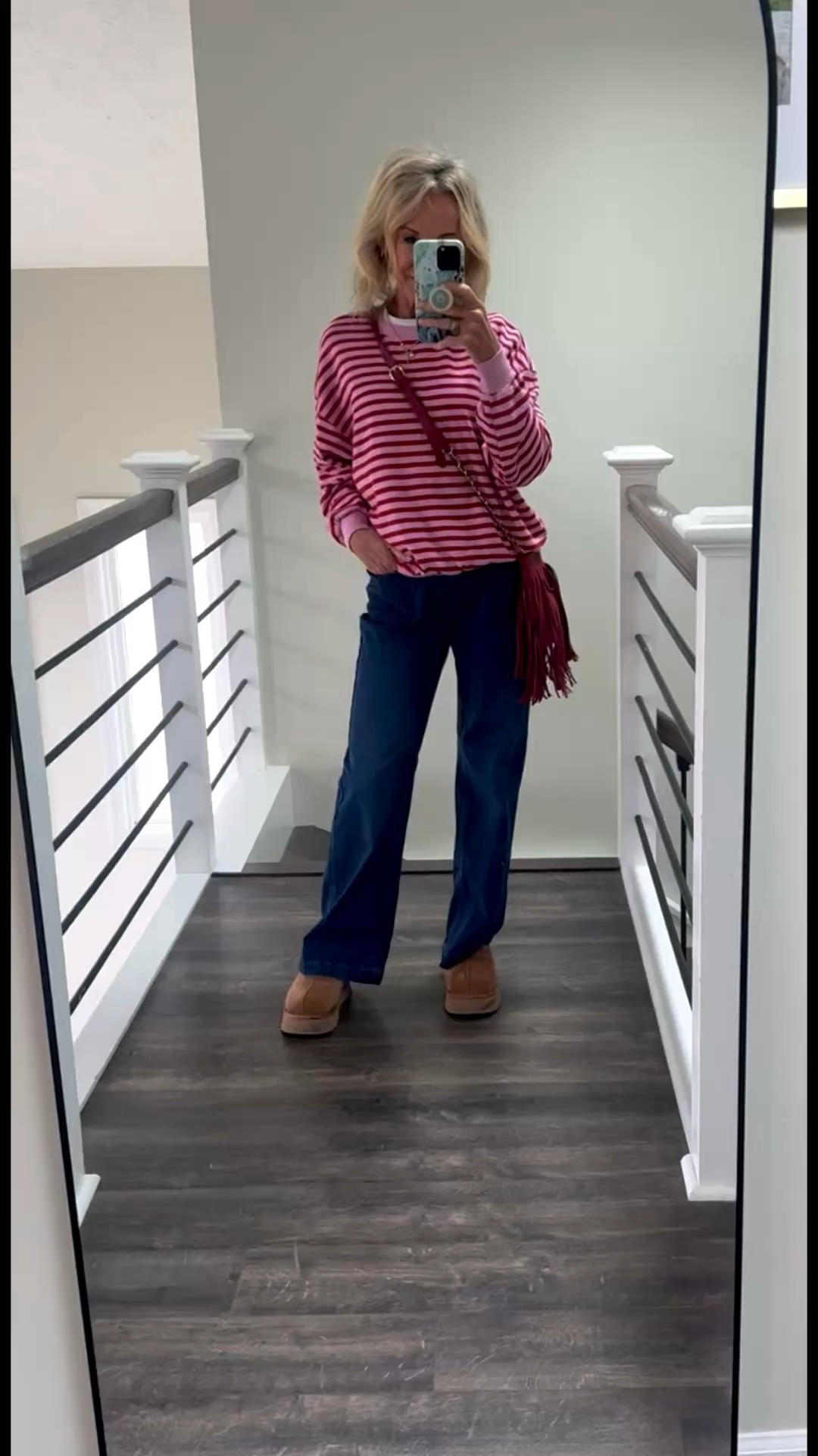 Casual cozy fit for this cold front, but make it bright. #fringedbag #pinksweatshirt #oversizedfit #jeans 

#LTKootd #LTKPetite #LTKOver40