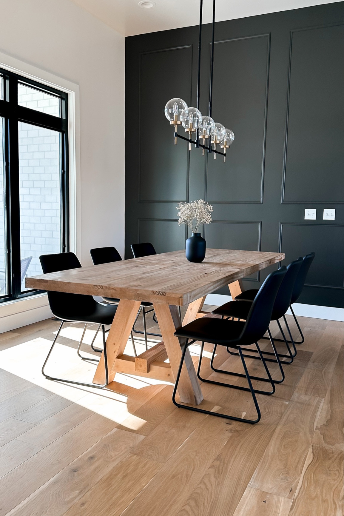This black accent wall in my dining room turned out perfect with our black leather chairs and white oak natural dining table. I am loving every step of designing and decorating our home! 
.
.
Home decor, modern organic, organic modern, transitional, industrial, dining room, table and chairs
.
#diningroom #dining #diningroomdecor #diningtable #diningroomdesign #diningtabledecor #diningchairs #diningchair #diningroominspo #diningroomideas #diningroomgoals #accentwall #swironore #sherwinwilliams #sherwinwilliamsironore #blackwall #black #blackaccentwall #minimalisthome #minimalistdesign #minimalistdecor #potterybarn #potterybarnstyle #potterybarntable #potterybarnlighting #targethome #targethomestyle


#LTKSeasonal #LTKstyletip #LTKhome
