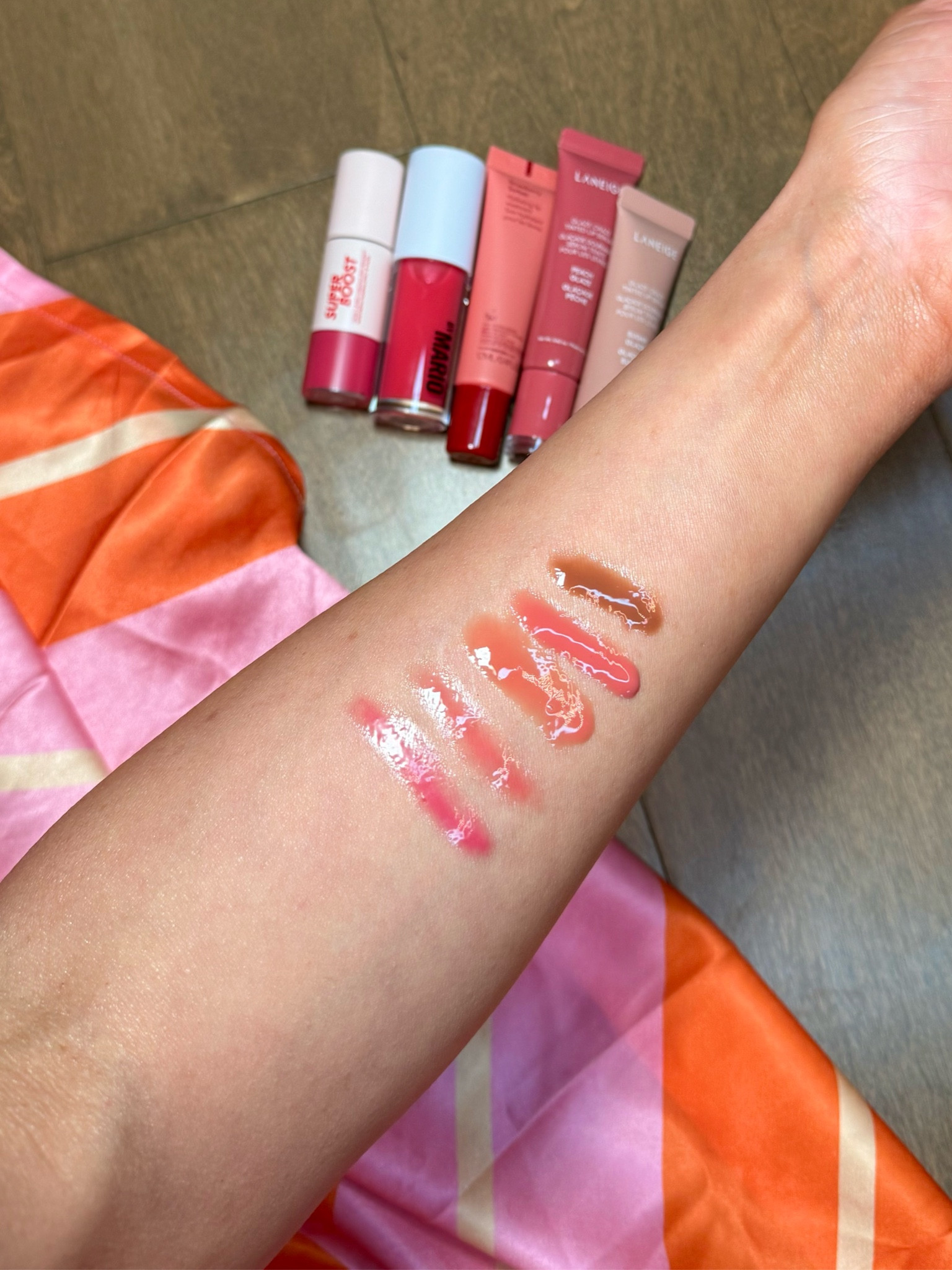 Left to right:

Makeup Forever Gloss: 09 Darling Candy
Makeup by Mario Gloss: Watermelon
OleHenrickson Gloss: Strawberry Sorbet
Laneige Gloss: Peach Glaze & Sugar Glaze

#LTKBeauty #LTKStyleTip