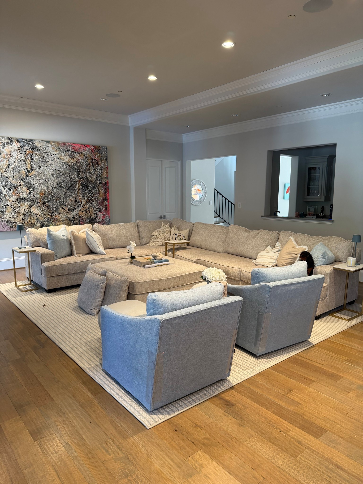 Our family room setup 🤍
Sharing everything from our living room because I got so many questions yesterday. This space is designed to actually be lived in — cozy, neutral, kid-friendly, and perfect for movie nights or having friends over.

Linked the sectional sofa, accent chairs, area rug, coffee table, pillows, side tables, and all the little styling pieces that make it feel pulled together without being precious. If you’re looking for a comfortable family room layout, neutral living room furniture, or a large sectional setup for an open concept space, this is it.

All sources + similar options are linked here 🤍

#LTKFindsUnder100 #LTKSaleAlert #LTKHome