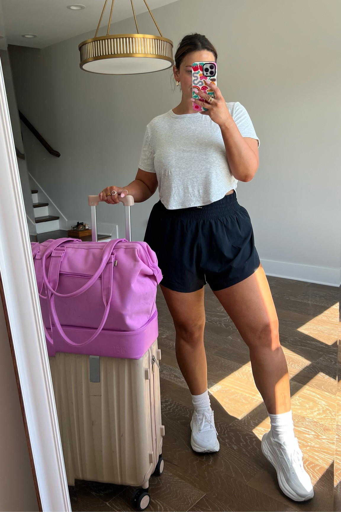 Travel fit that’s comfy and cute! XXL in the top and it’s giving very high end! I bought 2 other colors! It’s such good ribbed quality. Could use a XL! Wearing a Large in the shorts and they are one of my fav athletic shorts!! Oversized so true to biker short size if not size down! My Beis bag is my FAV! I have the mini and it’s plenty big for shoes and cosmetics and clothes. It fits under a plane seat! 

#LTKFitness #LTKTravel #LTKActive