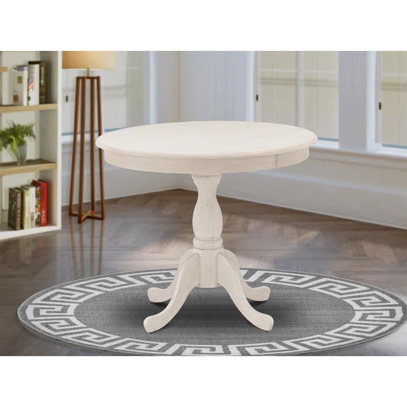 Comari 36" Solid Wood Pedestal Dining Table | Wayfair North America