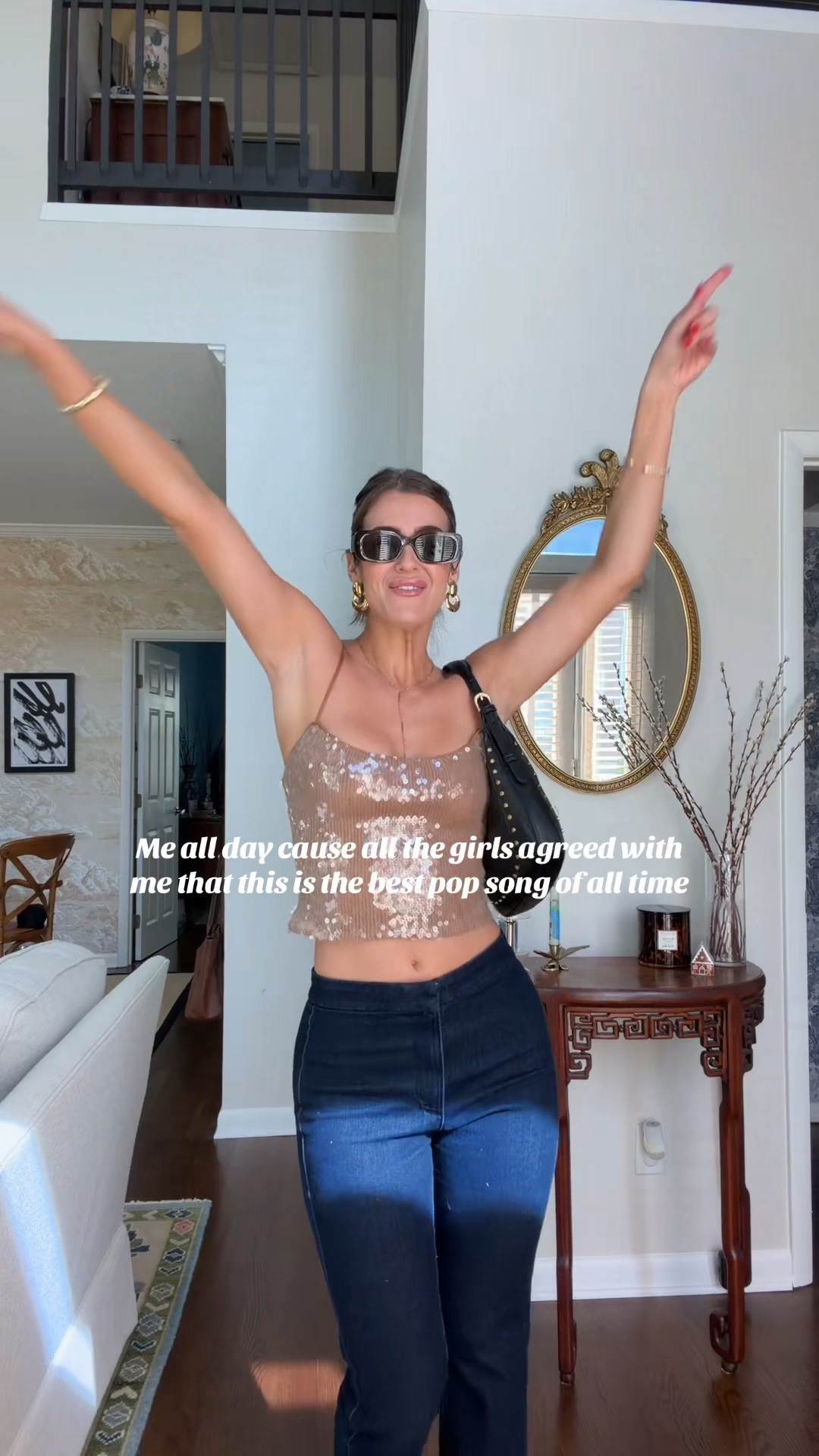 Outfit of the day: gold sparkly cropped tank, amazing dark wash flared legs jeans (only $30!!!) a back studded purse and gold jewelry to tie it all together ✨

#LTKootd