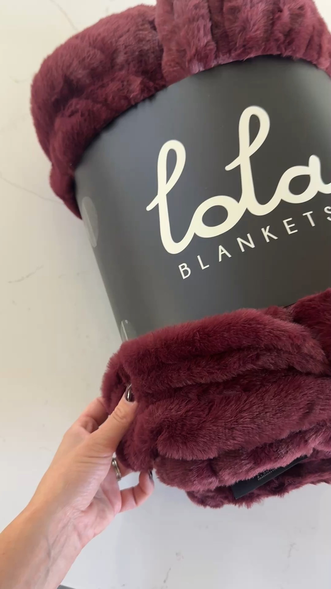 Lola Blankets are so good. This Burgundy color is perfection! These blankets make such great gifts that everyone will love.#LTKStyleTip I love the large size and then I did get my kids the medium size for Christmas in the tiger print. 

#LTKHome #LTKHoliday #LTKGiftGuide