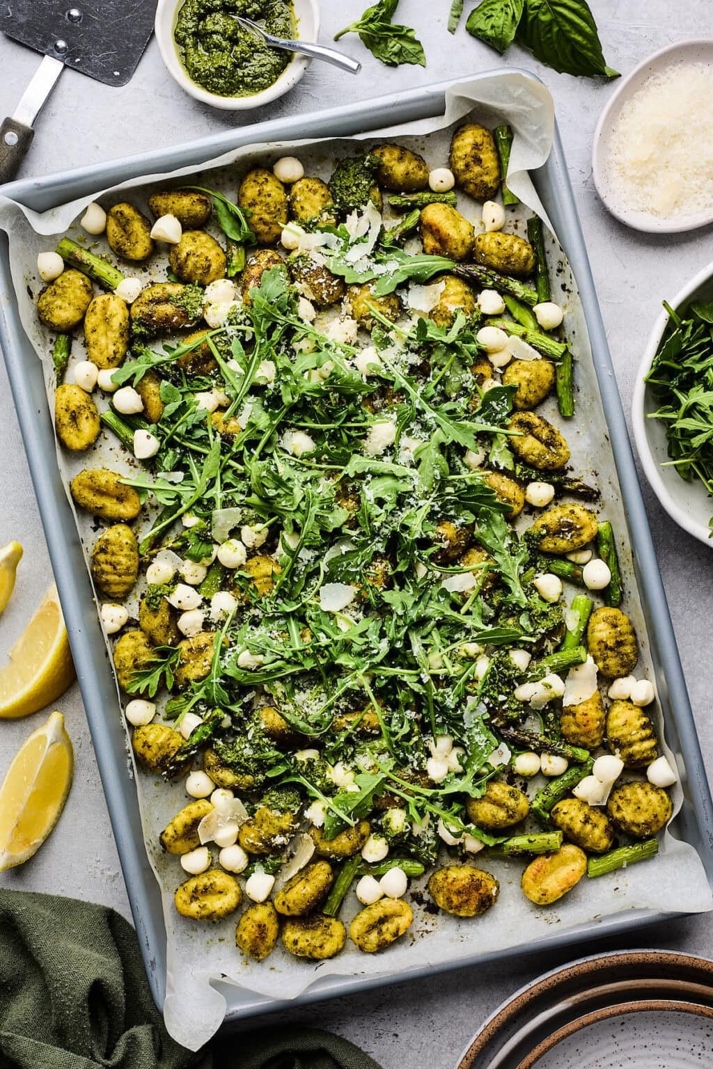 This easy Spring Sheet Pan Gnocchi is the kind of meal you’ll want on repeat—quick to prep, full of fresh seasonal flavor, and all made on one pan. Roasted pesto gnocchi gets crispy on the outside, asparagus stays perfectly tender, and everything is finished with creamy mozzarella, arugula, a little more pesto, and Parmesan. It’s simple enough for a weeknight, but impressive enough for guests! Full recipe here https://www.twopeasandtheirpod.com/spring-sheet-pan-gnocchi/

#LTKHome #LTKSeasonal #LTKFindsUnder50