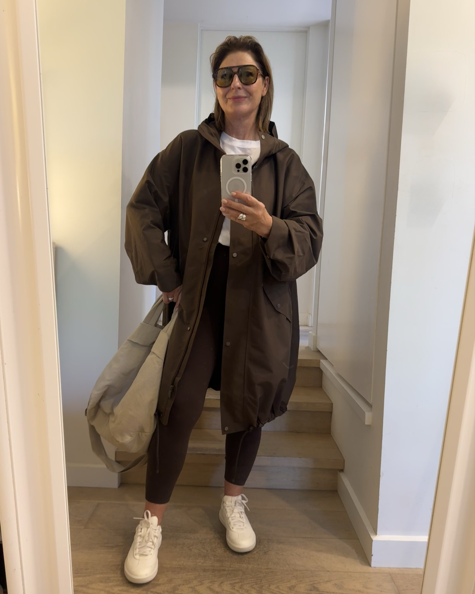 Found; The chicest rain coat ! 
It’s called the ‘oversized cocoon raincoat’ from lululemon . In the colour of the season , a delicious chocolate brown,  it’s totally versatile from work to weekends: I’m wearing it with the lululemon leggins as well as with the daydrift pants , blue jeans and pleather pants . 
I’m wearing a size large in the rain coat and it very roomy ! 
Wearing a size 8us in the leggings and a size large in the organic white tee and in the brown tee . 
Shop my picks ! #lululemonanz

#LTKdayinmylife #LTKActive #LTKOver40