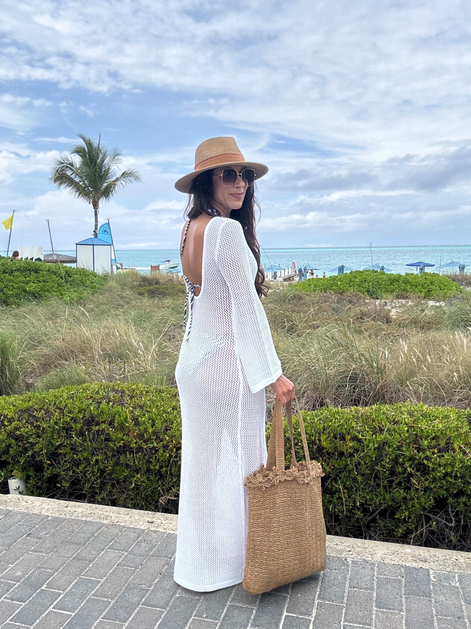 Loving this coverup! Wearing a size small - not too clingy or long. Great coverage and fit  

#LTKSwim #LTKSeasonal #LTKTravel