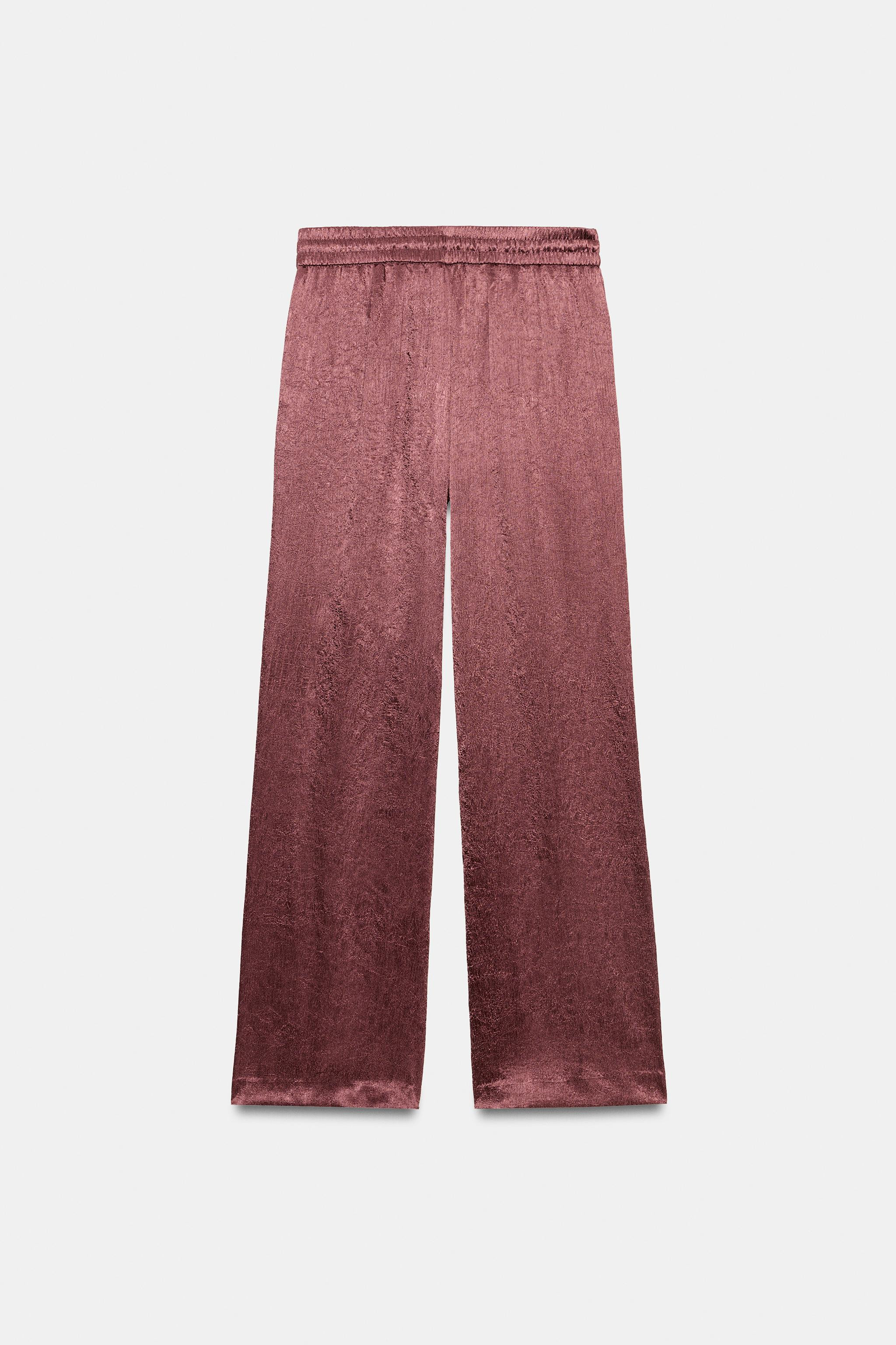High-waisted pants with an adjustable drawstring elastic waistband. Front pockets. Crinkled satin... | Zara US