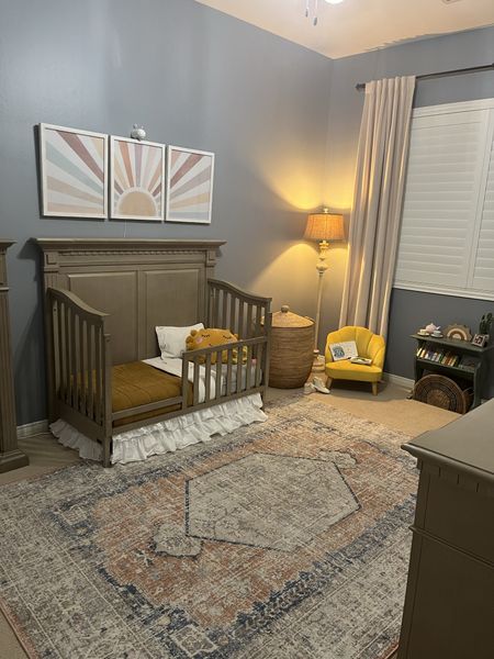 🌞 A room for the Sun Queen herself! 🌞

This room got new carpet, a fresh coat of paint, custom shutters as well as furniture and finishing touches.

▫️Kingsley Venetian 4-In-1 Convertible Crib from @buybuybaby is no longer in stock but I found a similar style on Pottery Barn Kids
▫️Sunrise Prints from @etsy by #focusartocus 
▫️Wood Frames from @hobbylobby 
▫️Rainbow Toddler Quilt & Sham from @parachutehome is no longer in production
▫️Toddler Linen Box Quilt in Ochre from @parachutehome is no longer in production but the color Clay matches perfectly with the room’s color palette 
▫️Peach Florid Dreams Rug from @rugs_usa 
▫️Gold chair from @homegoods 
▫️Albert Velvet Solid Blackout Curtains in Ivory from @wayfair are no longer in stock but I linked a similar style
▫️La Jolla Baskets in natural size medium and large from @serenaandlily 
▫️Rainbow Woven Rattan Semi Circle Storage Basket with Handles, “Happy Place” Wire Wall Decor, and Boho Sun & Cactus Wood Garland are from @crateandkids

rise + SHINE ☀️ 
Southworth Design

#LTKbaby #LTKkids #LTKhome
