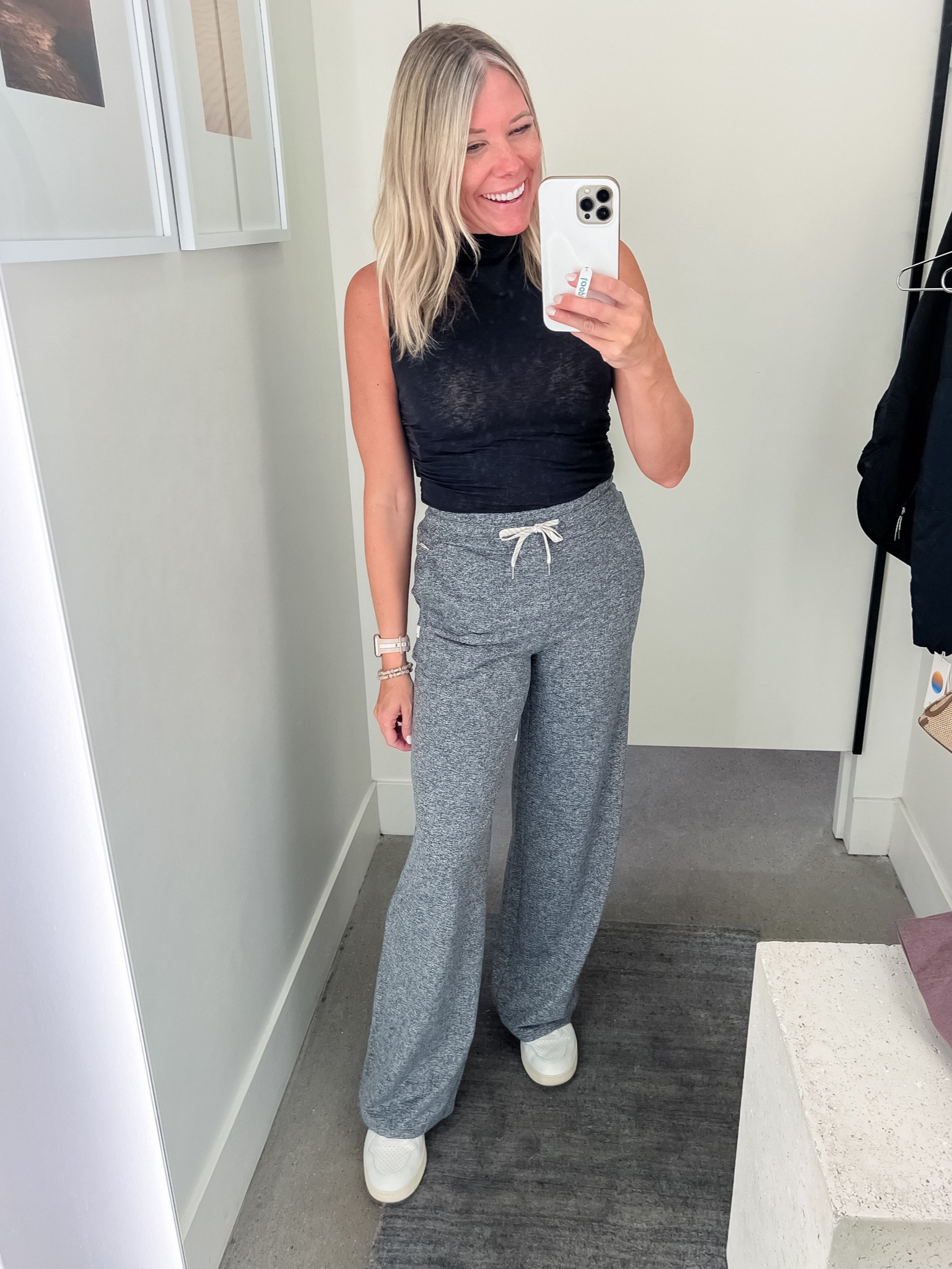 Love these wideleg sweatpants with a black mock turtleneck and white sneakers. XS pants and small top. Vuori 

#LTKstyletip #LTKover40 #LTKSeasonal